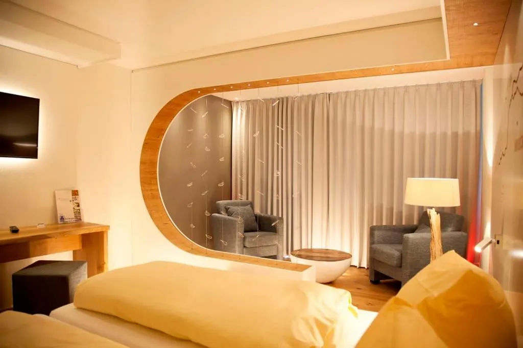 Seating area, Bed in Flair Hotel Nieder