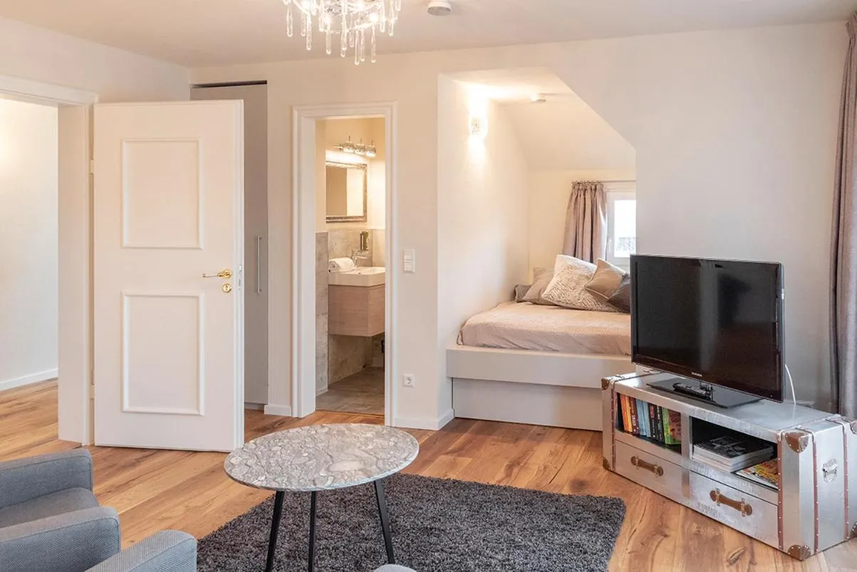 Living room, Bed in Boutique Hotel Friesinger