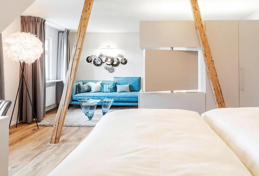 Living room, Bed in Boutique Hotel Friesinger