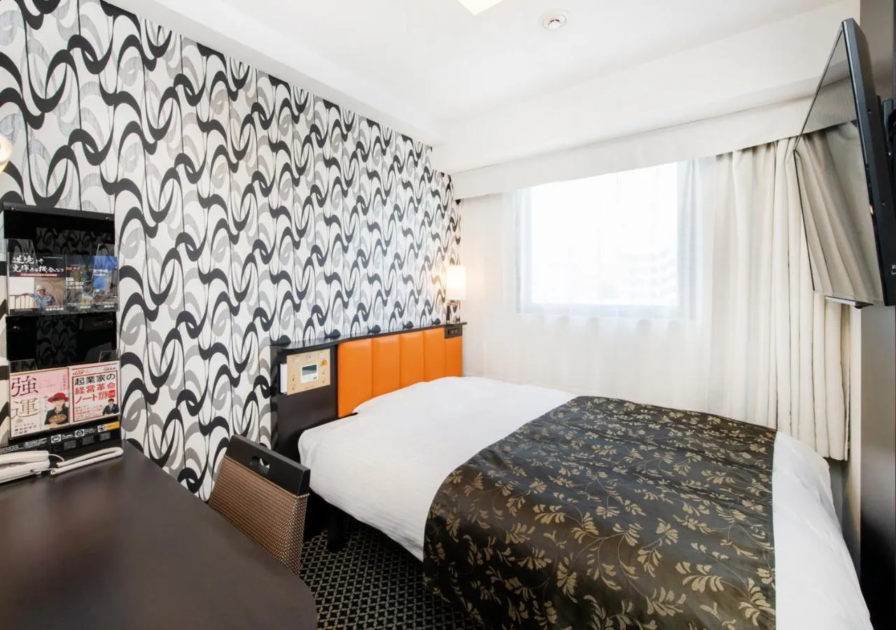 Photo of the whole room, Bed in APA Hotel Fukuoka Tenjin Nishi