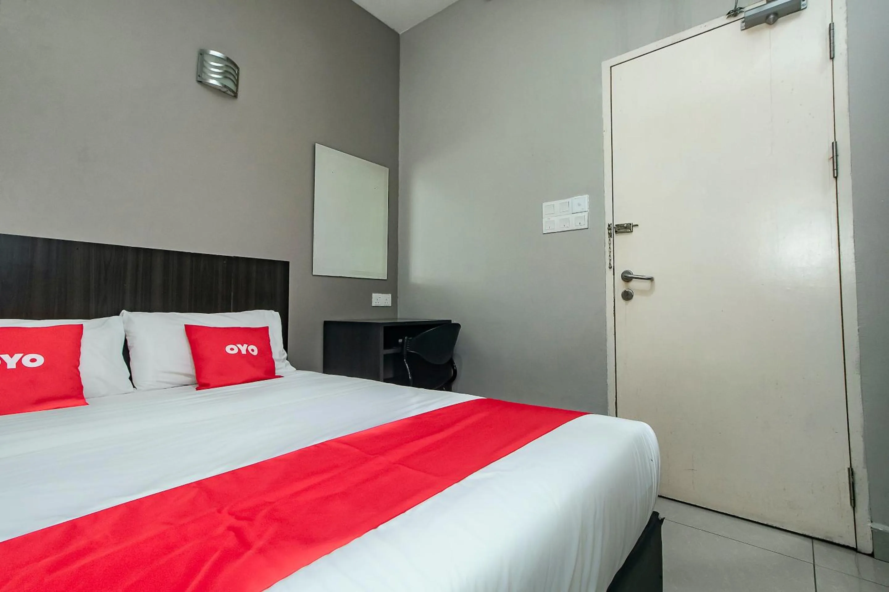 Bedroom, Bed in Hotel O Nice Stay Three Six Five Services