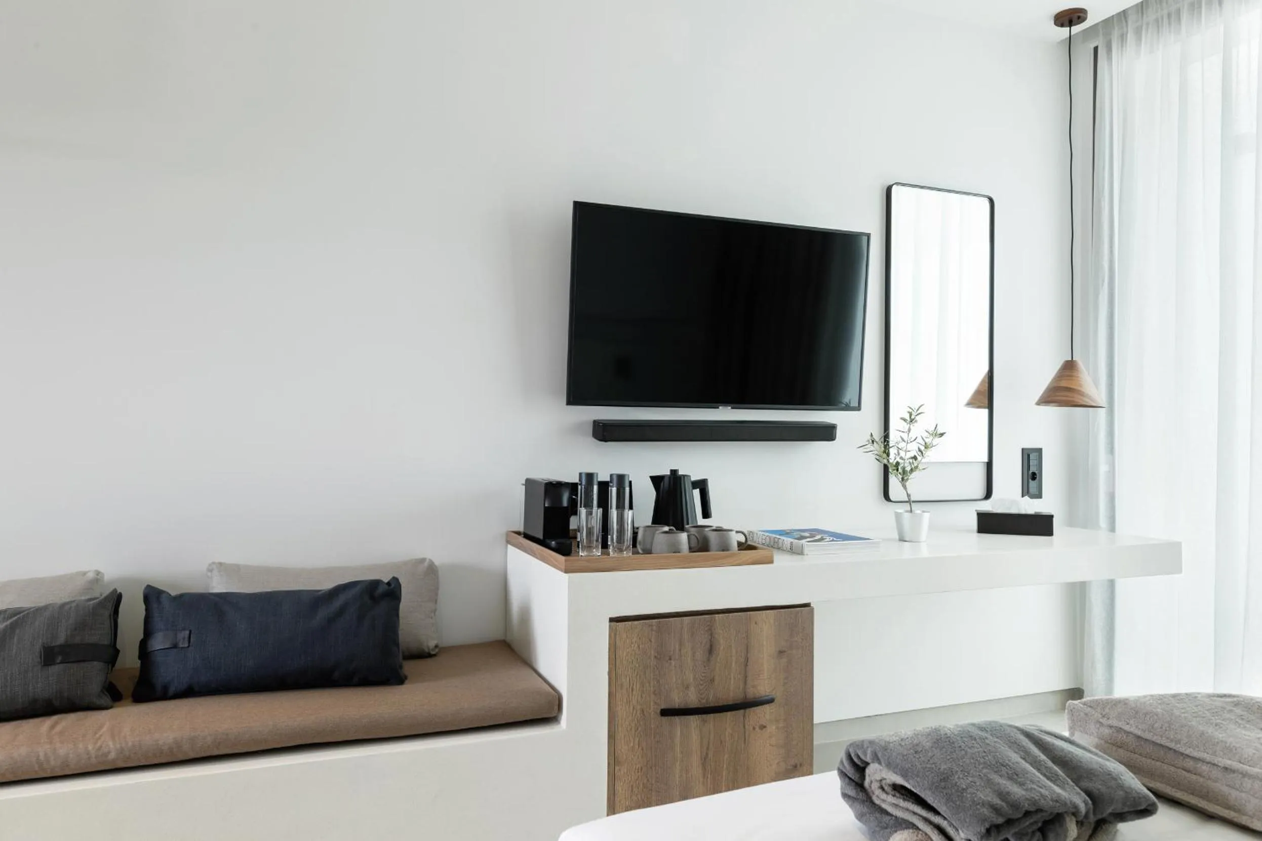 Seating area, Bed in Domes White Coast Milos, Adults Only