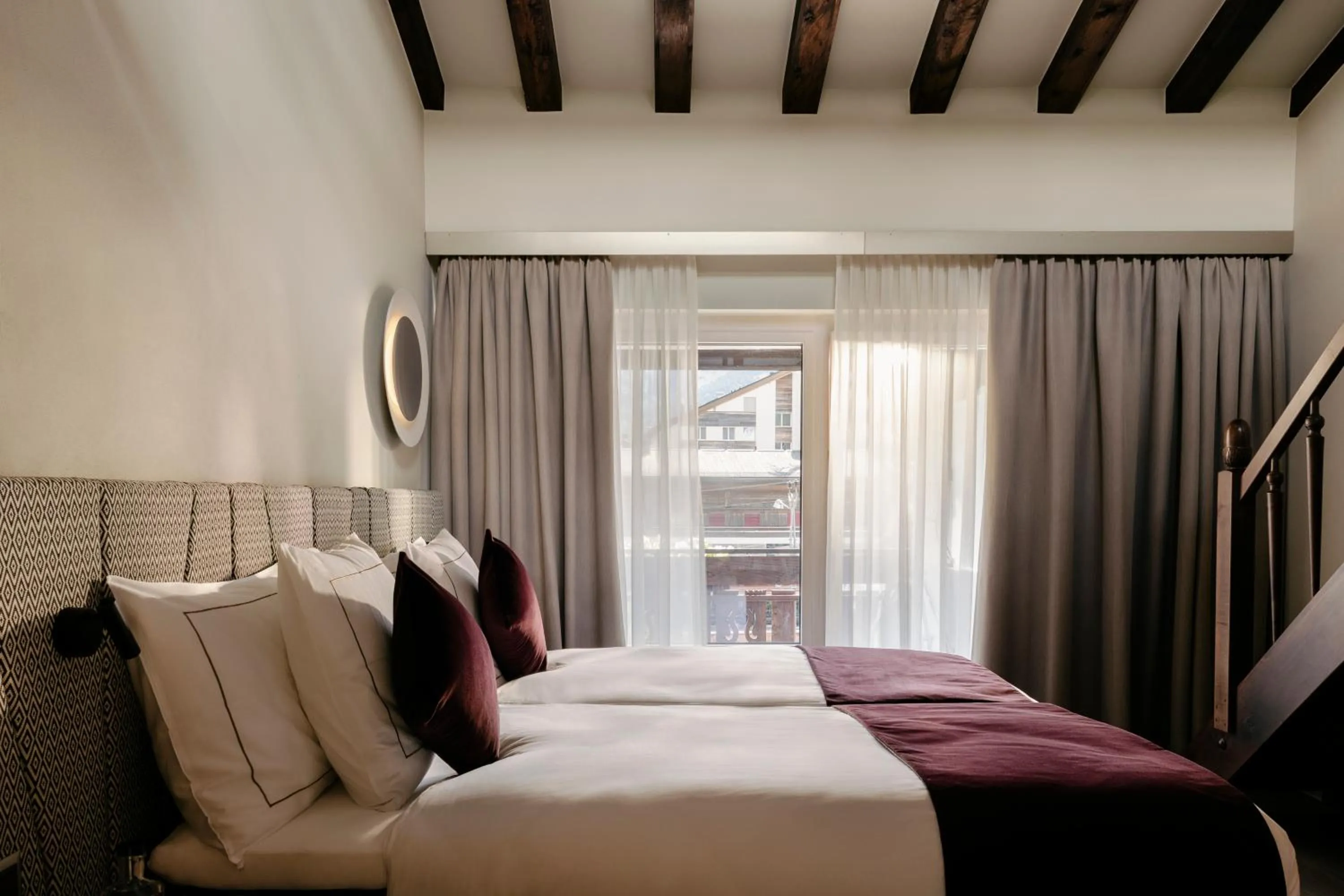 Bed in SCHLOSS Zermatt - CBD & Adaptogenic Spa and Sport Hotel