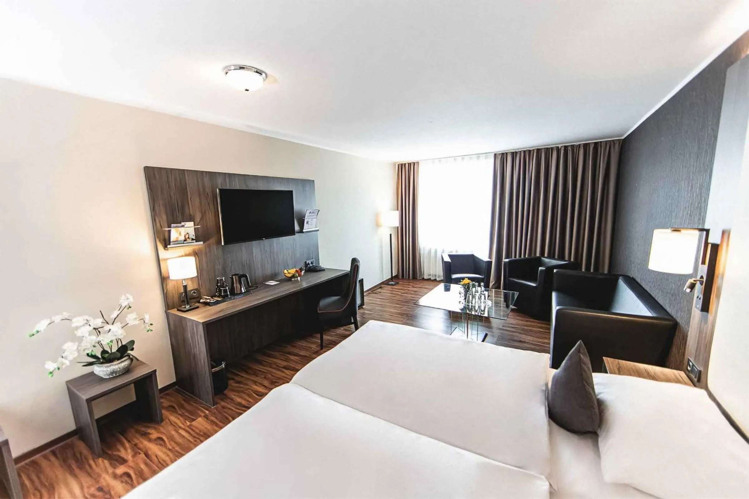 Seating area, Bed in Best Western PLAZA Hotel Grevenbroich