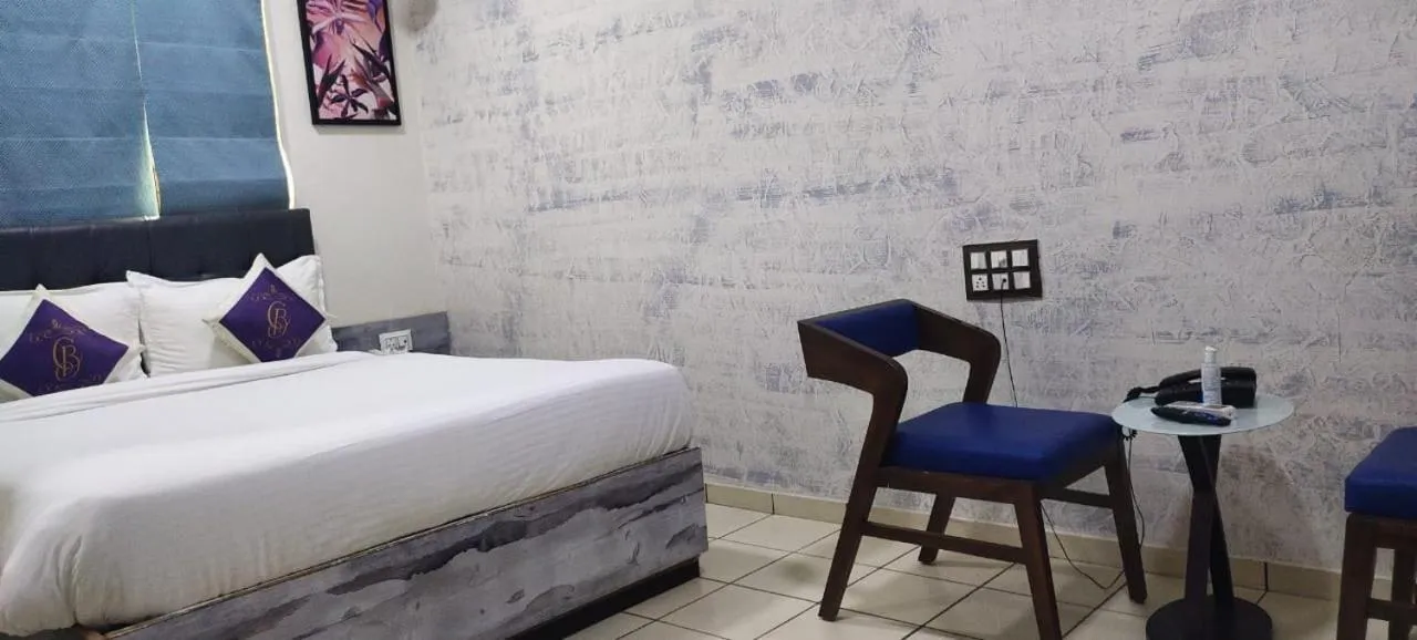 Seating area, Bed in Casa Blanca - A Boutique Resort