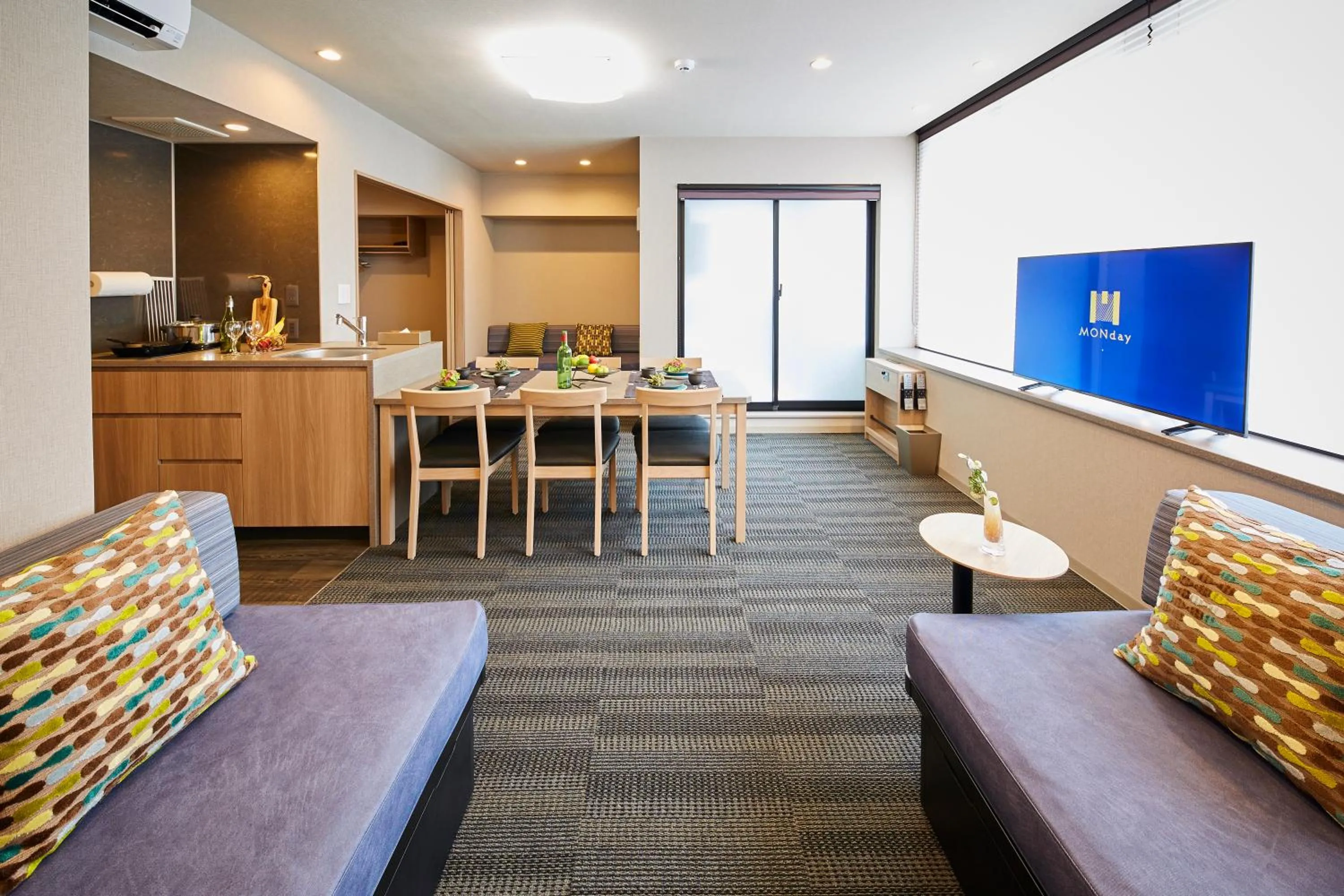 Living room in MONday Apart Premium HAMAMATSUCHO