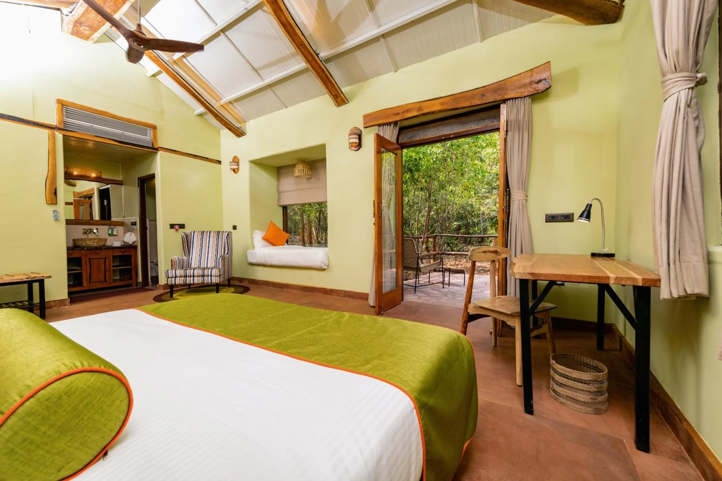 Bed in Kanha Jungle Camp