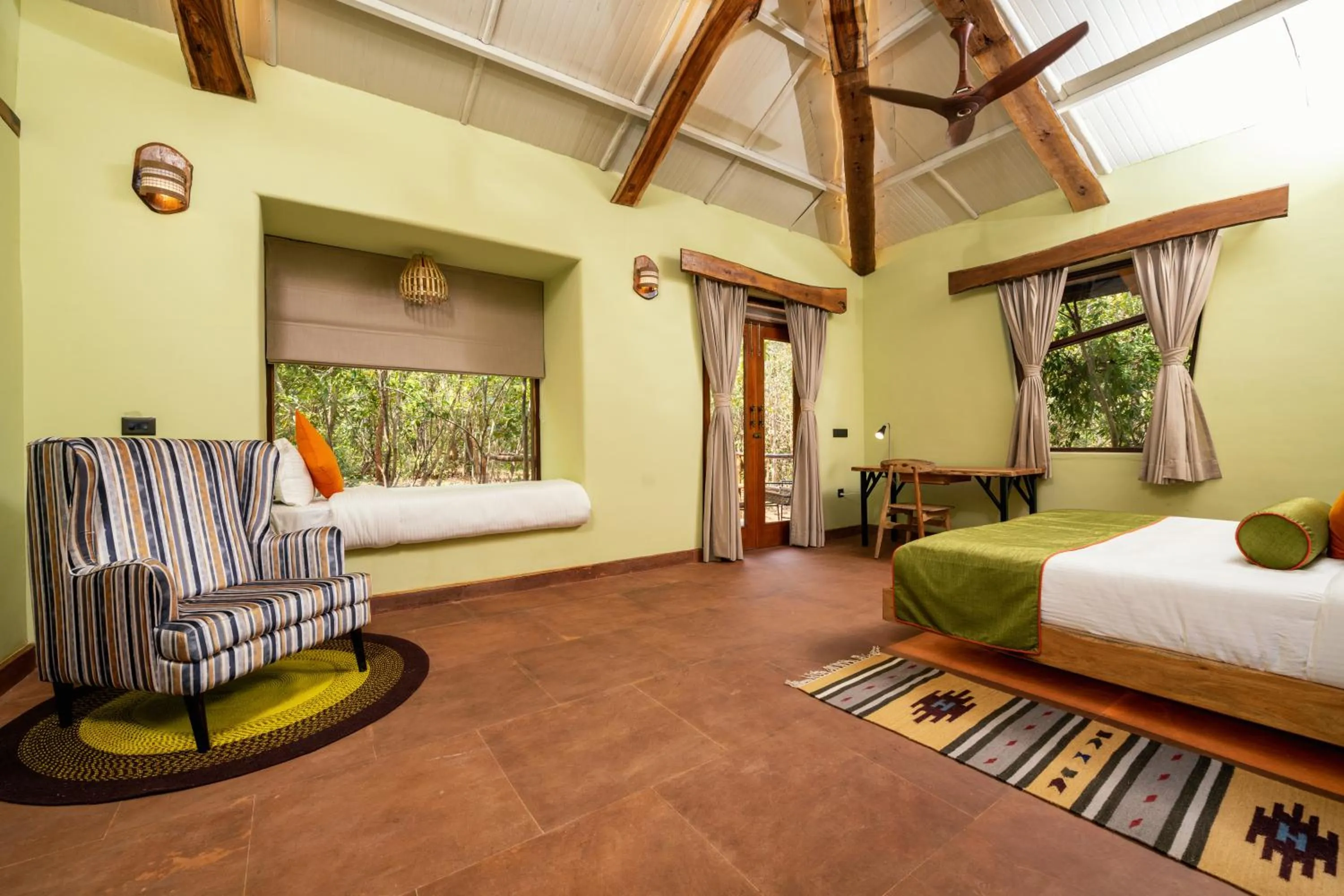 Bed in Kanha Jungle Camp