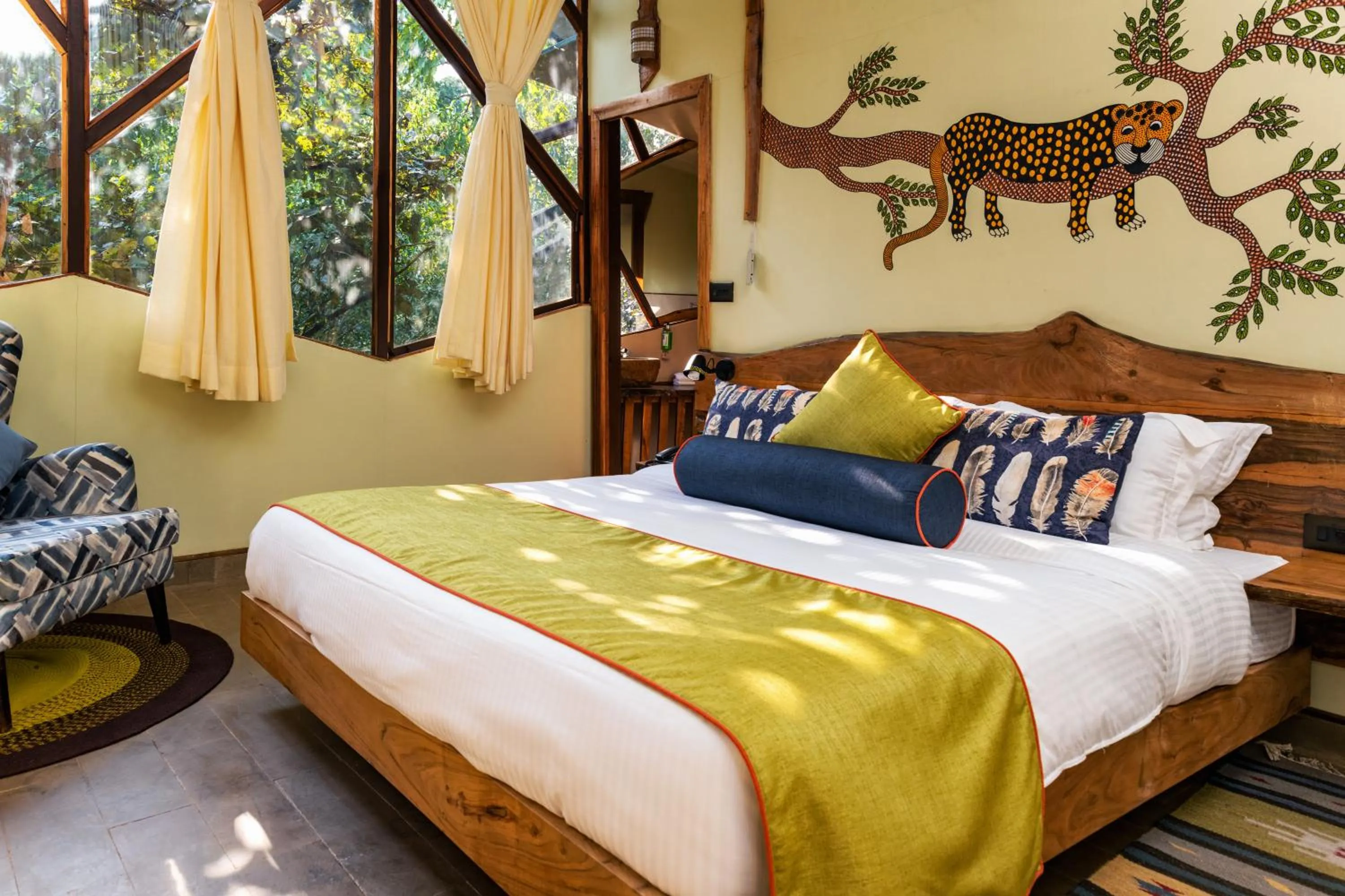 Bed in Kanha Jungle Camp