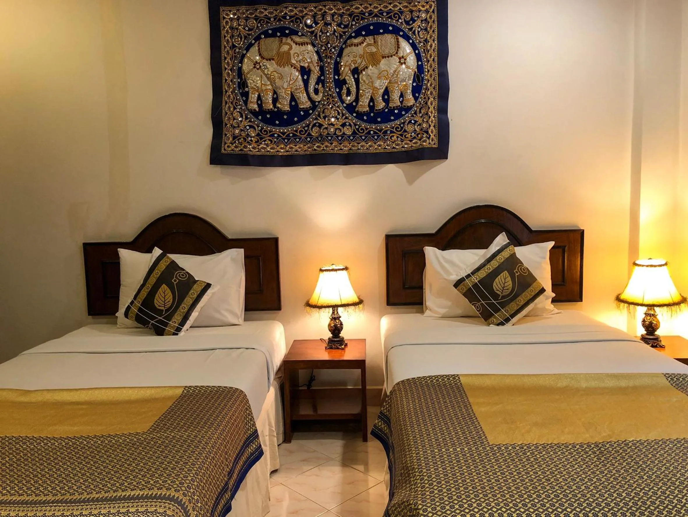 Bed in Ginis Beach Resort