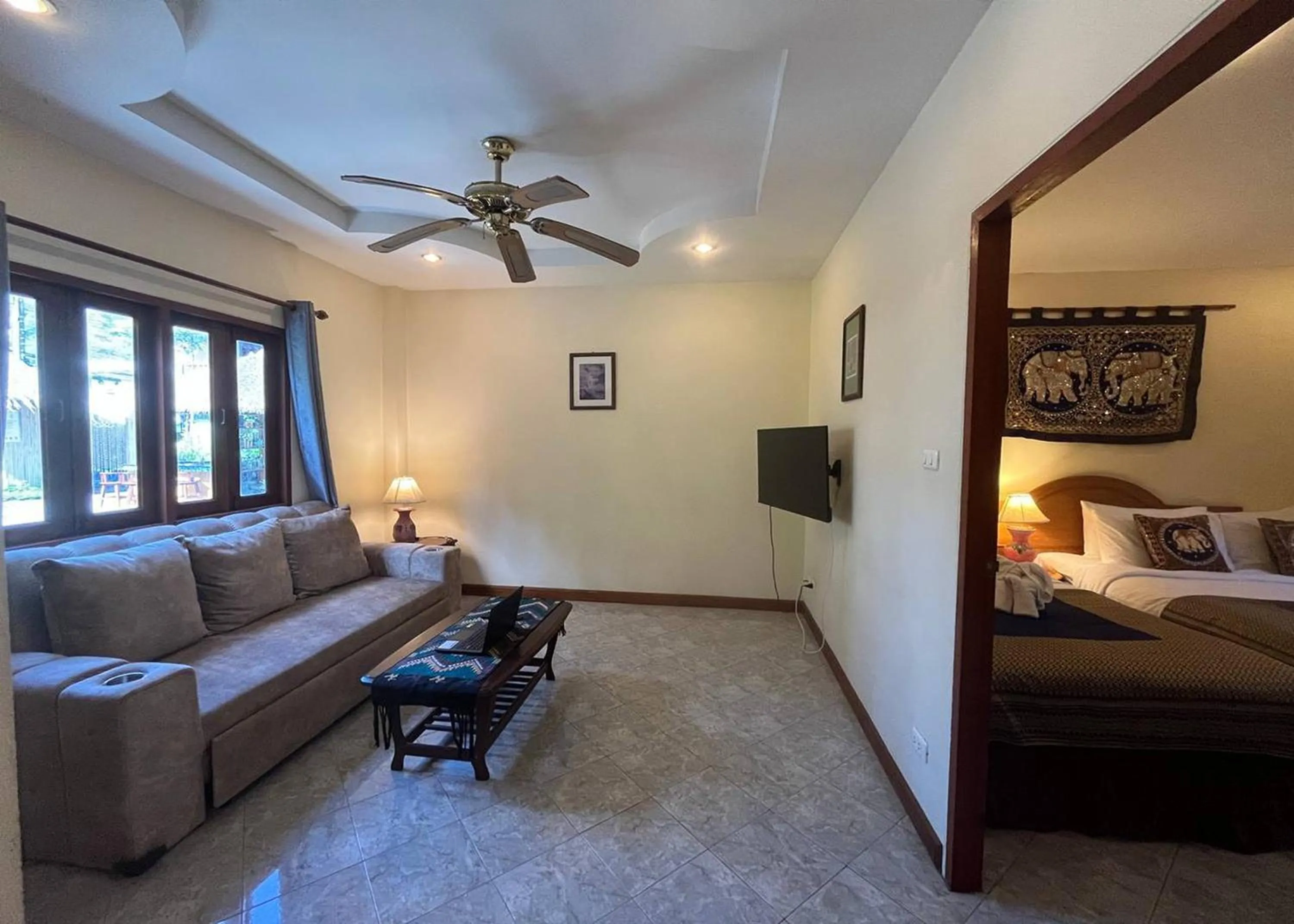 Seating area, Bed in Ginis Beach Resort