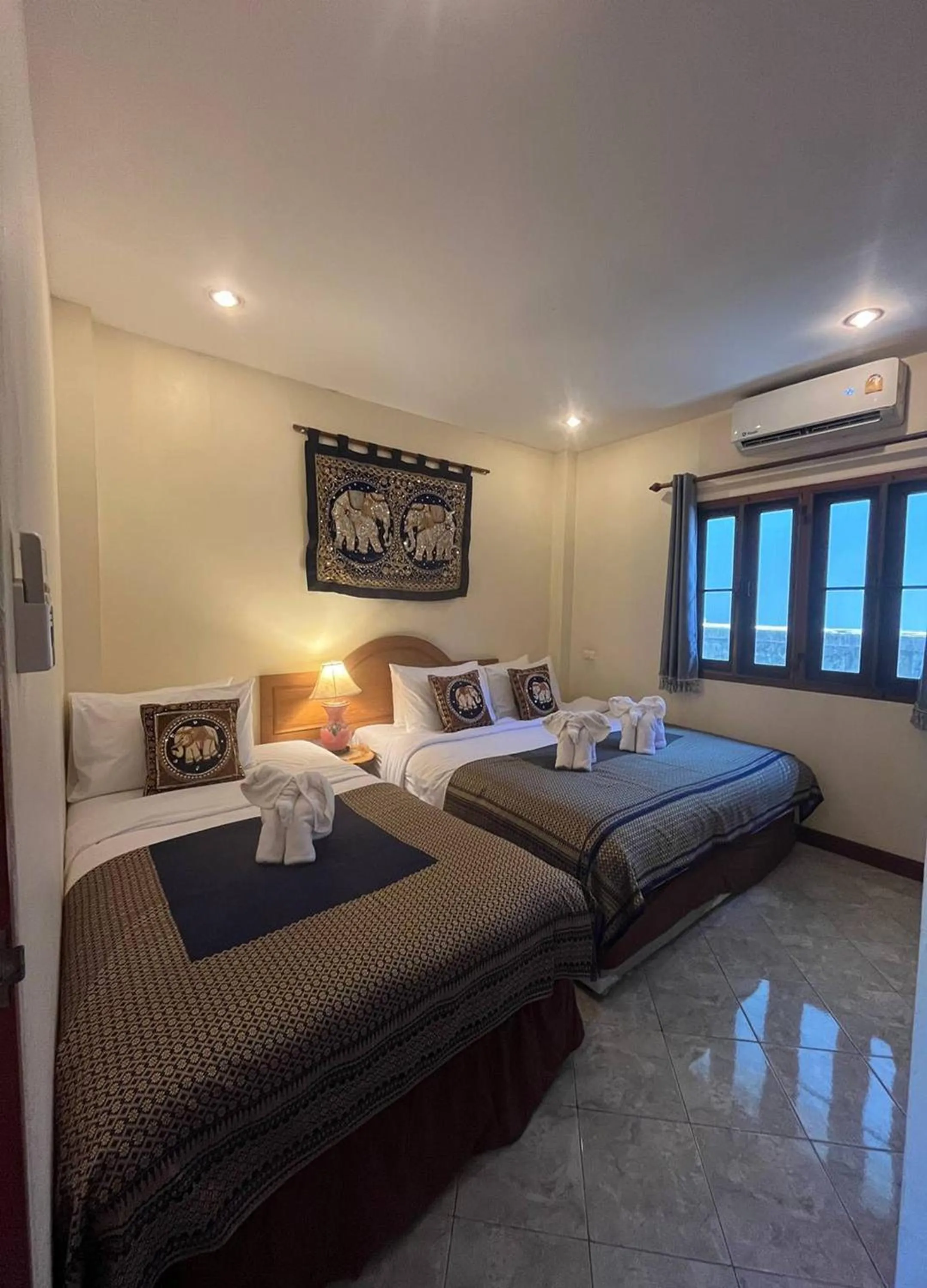 Bed in Ginis Beach Resort