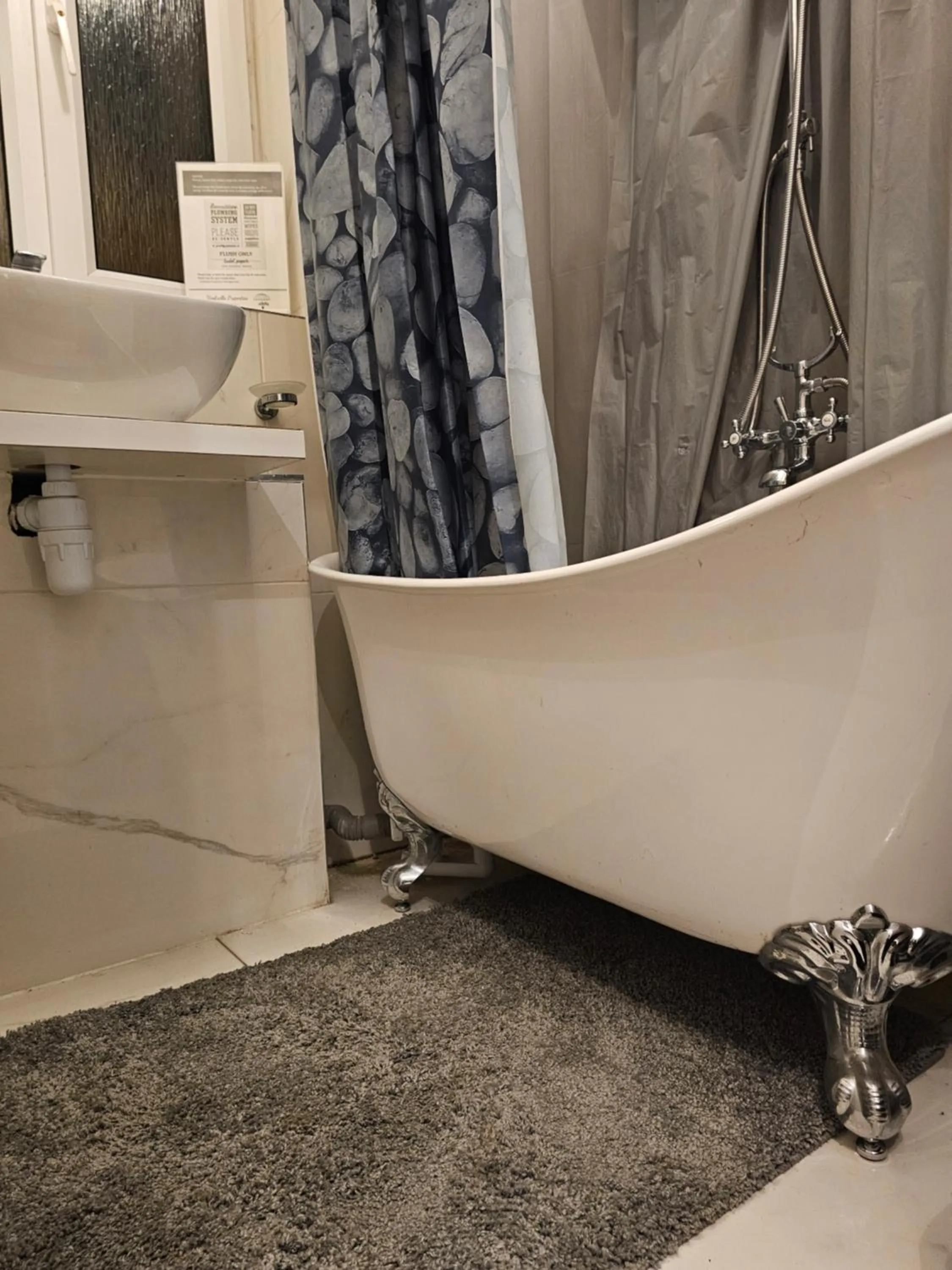 Shower in Umbrella Properties London Woolwich