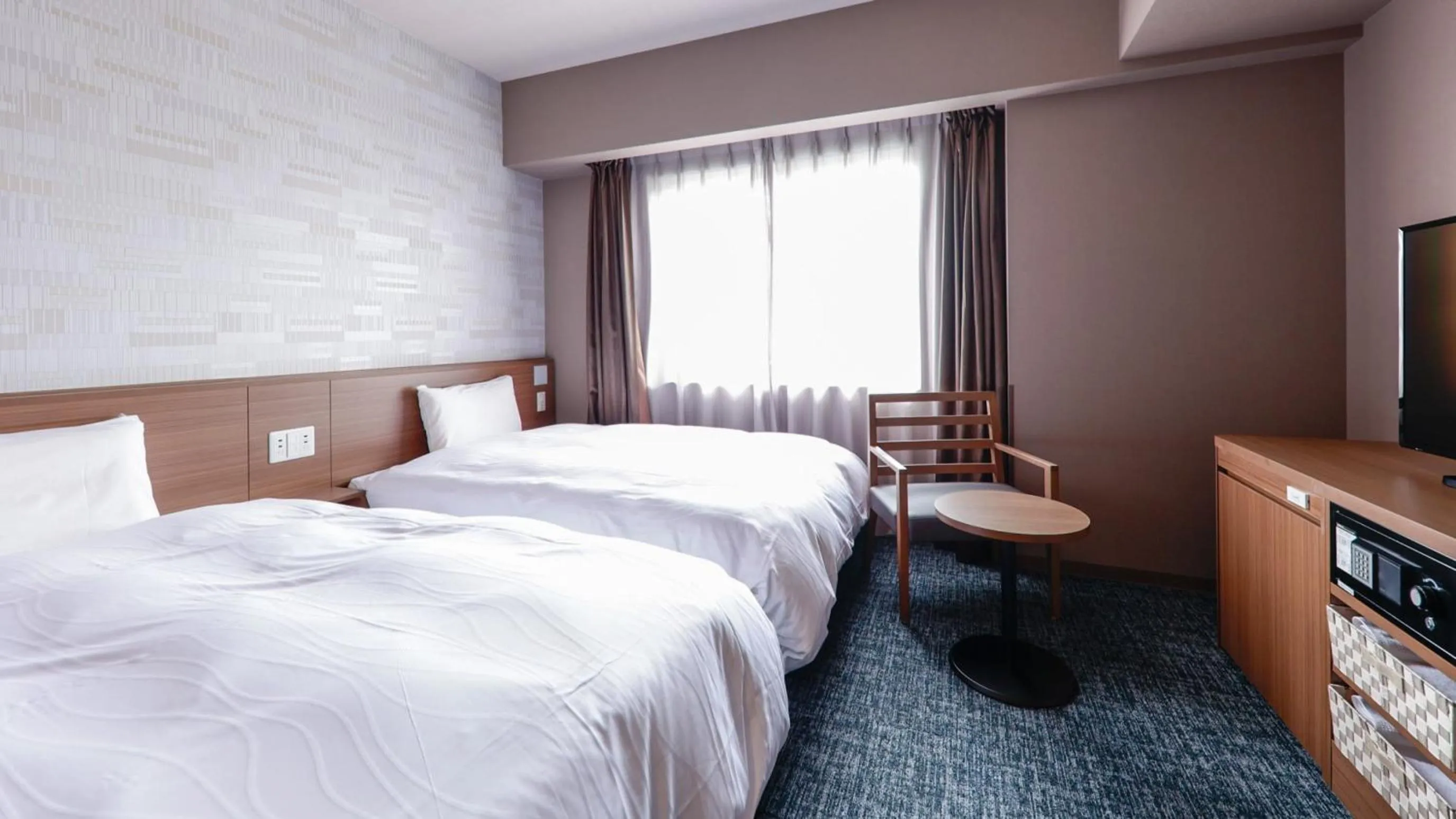 Bed in Dormy Inn Kobe Motomachi Natural Hot Springs