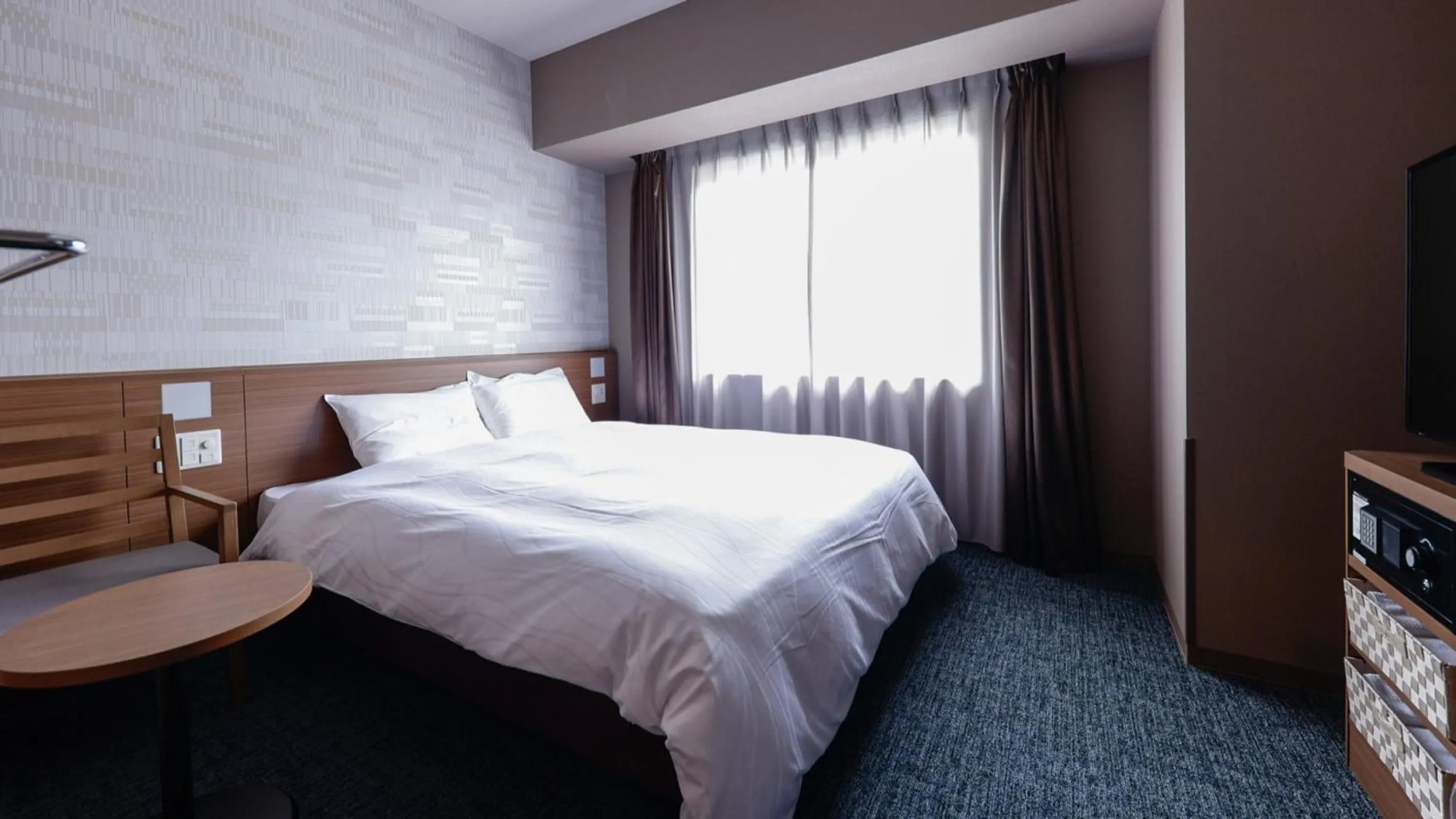 Bed in Dormy Inn Kobe Motomachi Natural Hot Springs