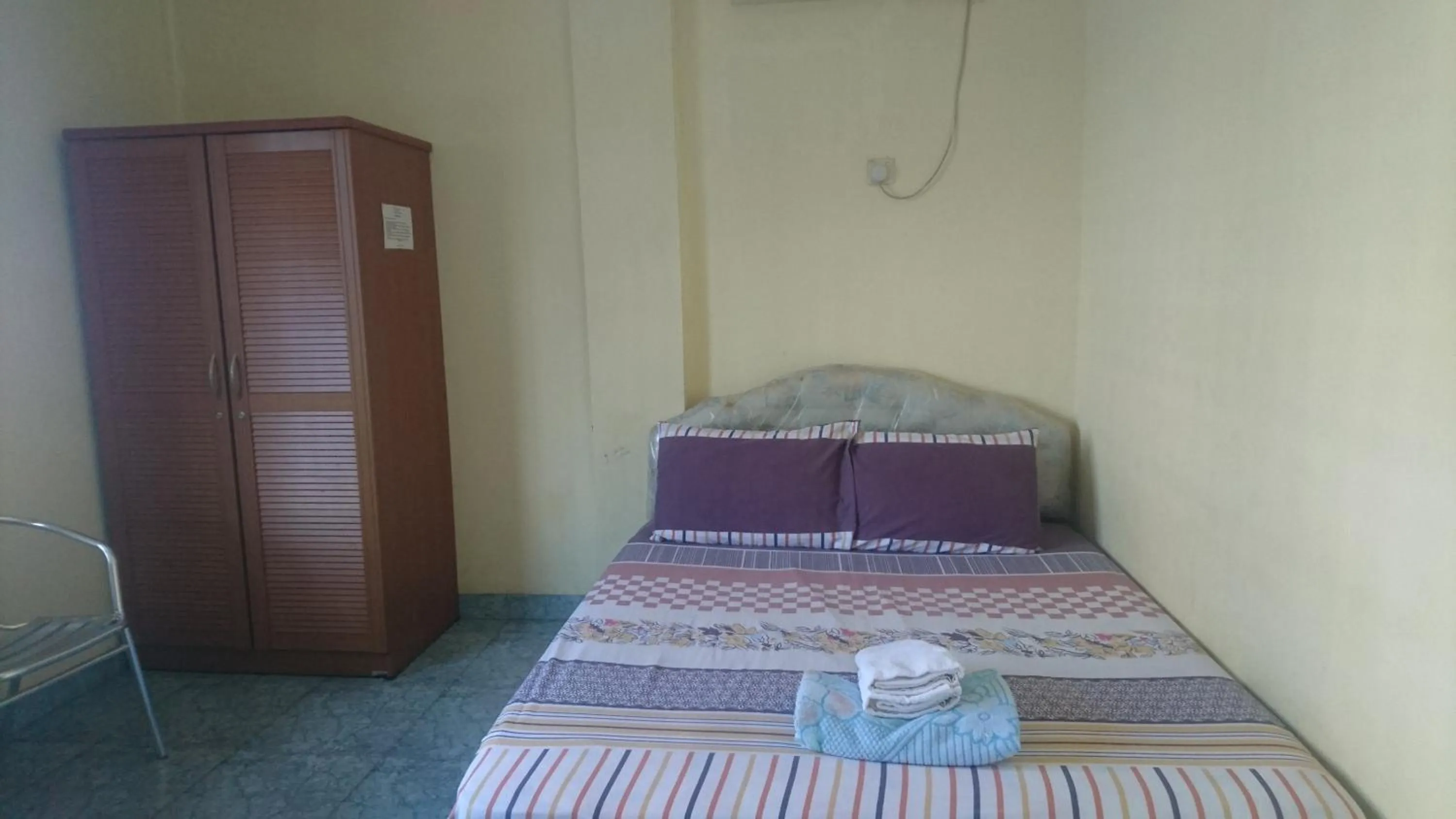 Bed in Hotel Pelita Terang