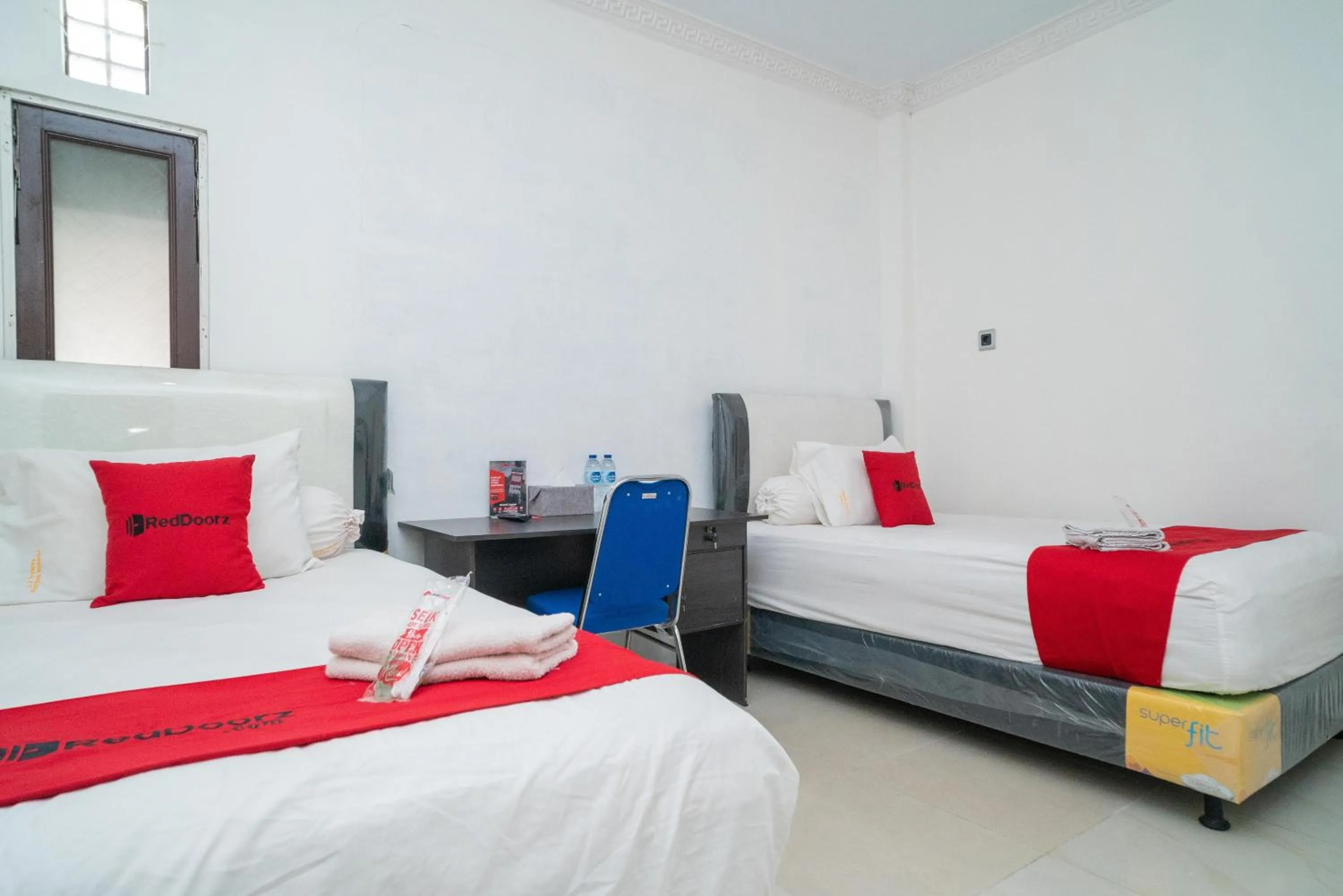 Bed in RedDoorz Syariah near Jalan A Yani KM 8 Citraland