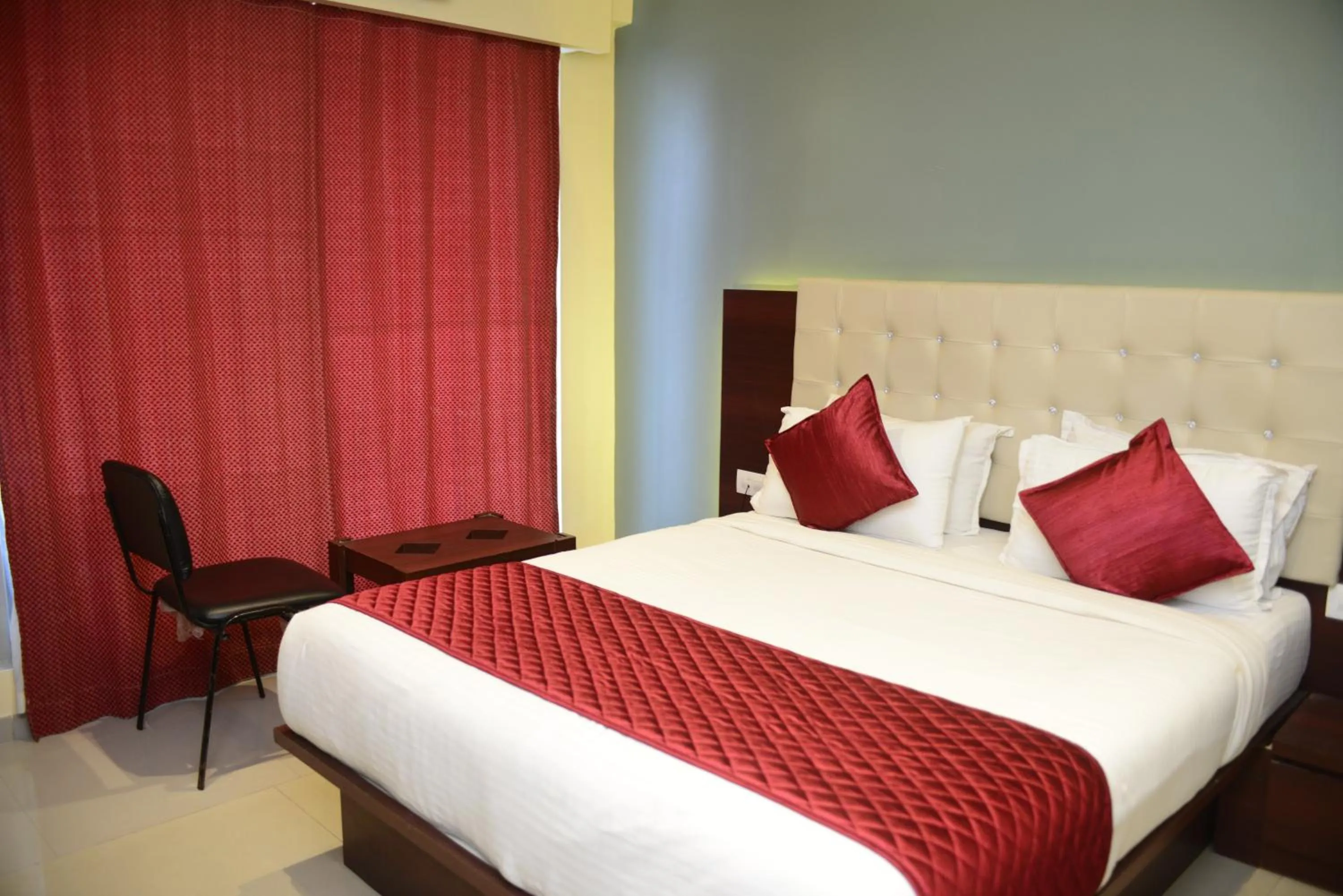 Photo of the whole room, Bed in Hotel Malad Inn opposite Malad Railway Station