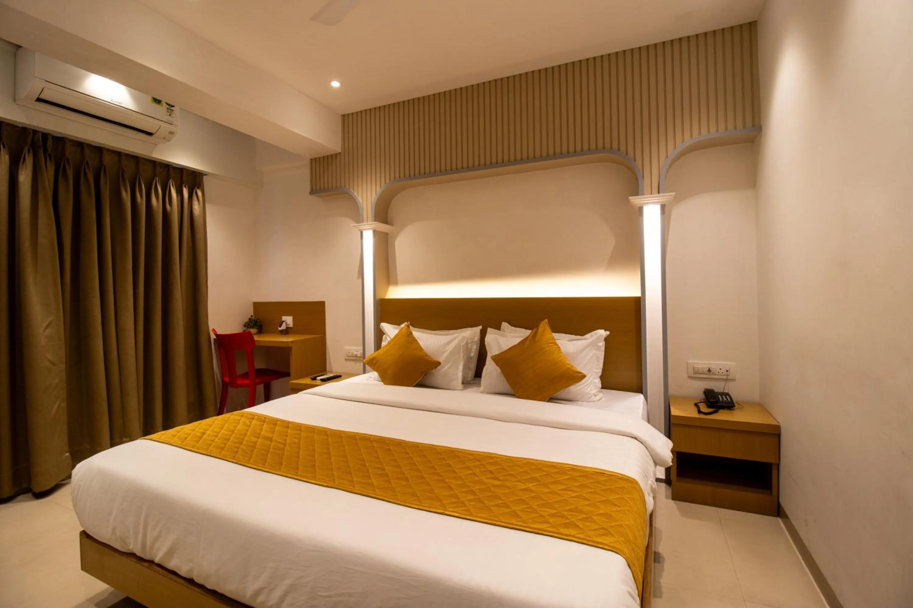 Photo of the whole room, Bed in Hotel Malad Inn opposite Malad Railway Station