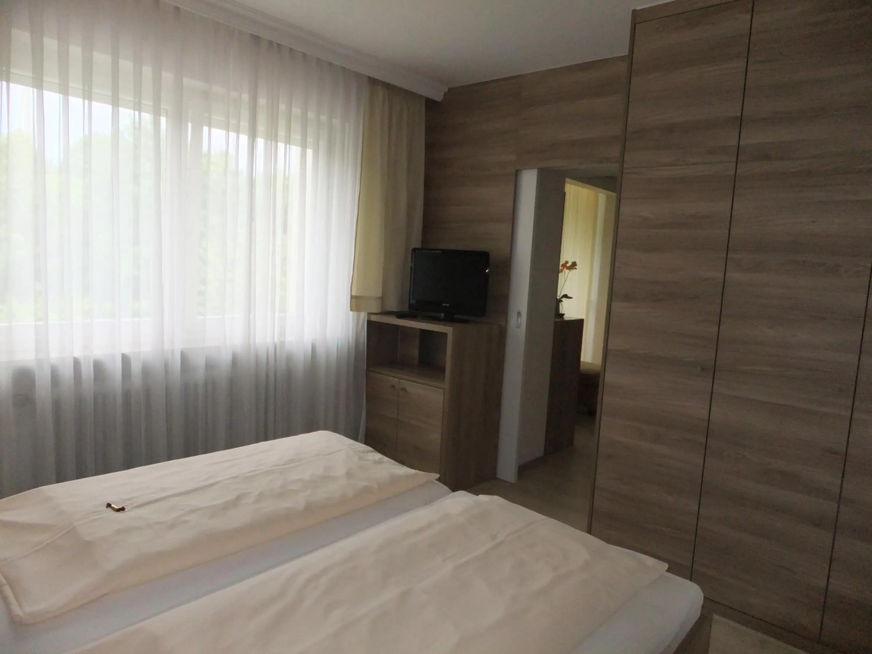 Bed in Aparthotel Christine