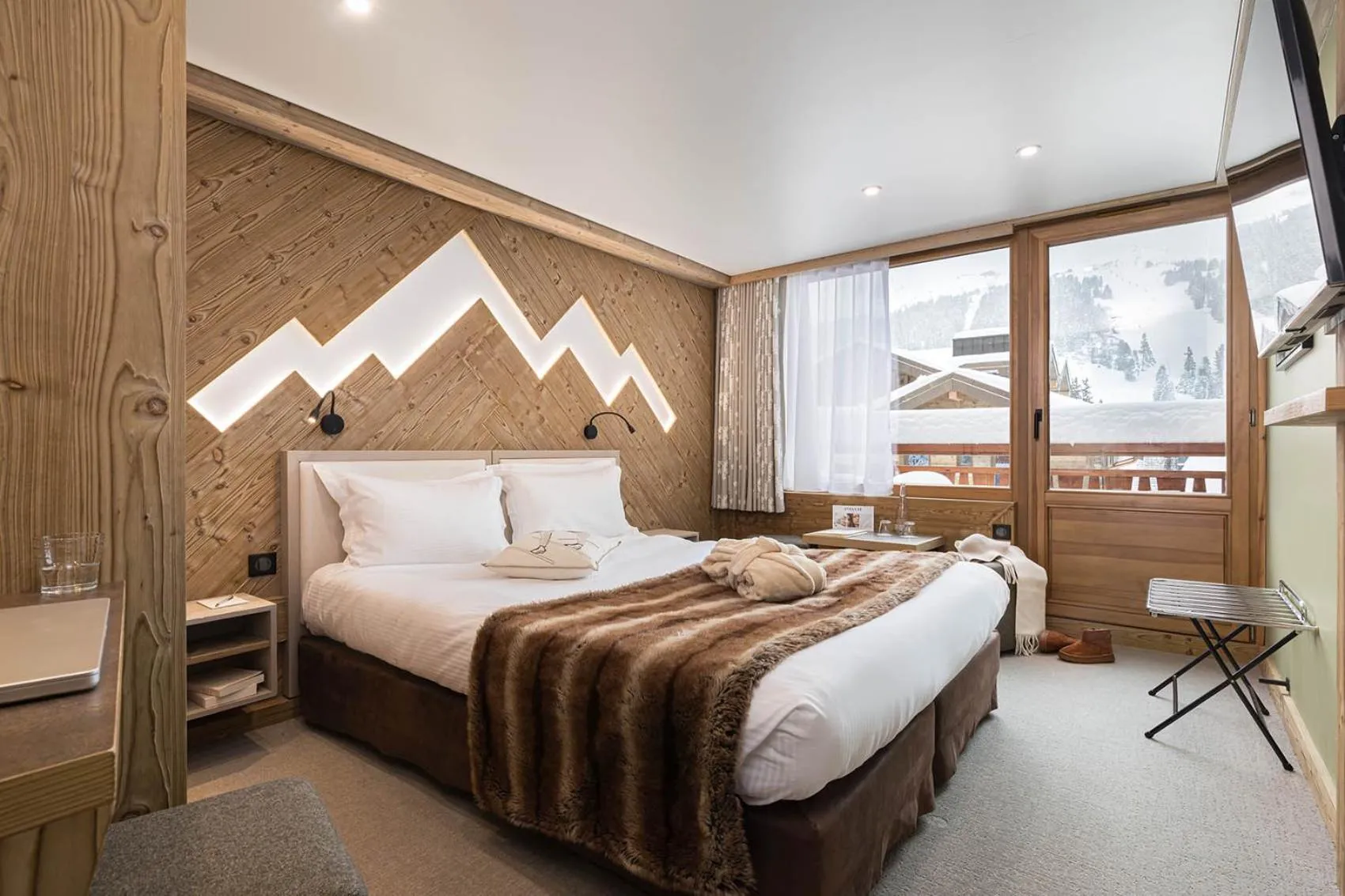 Bed in Hôtel Les Sherpas