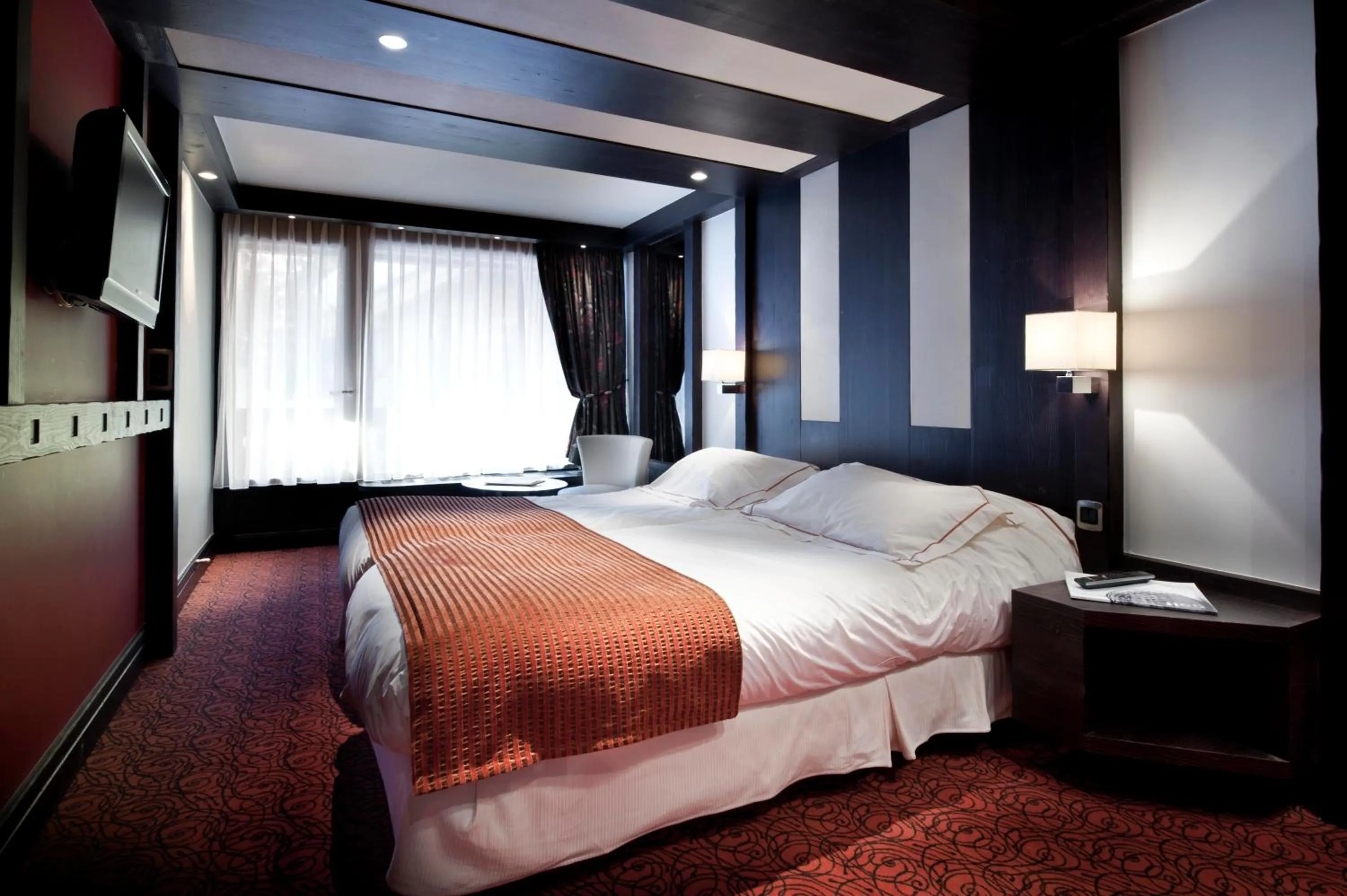 Bed in Hôtel Les Sherpas