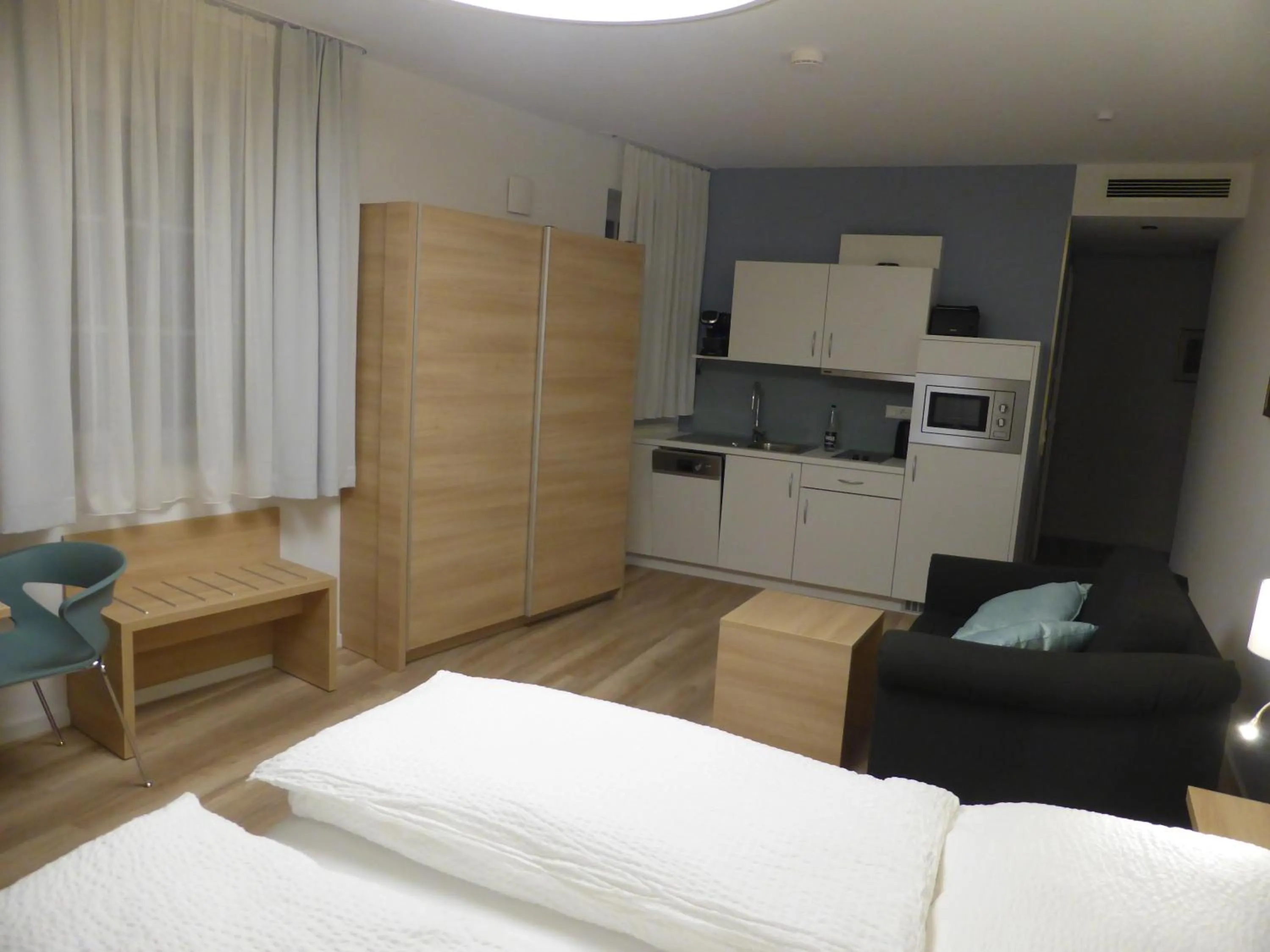 Bed in Leister Apparthotel