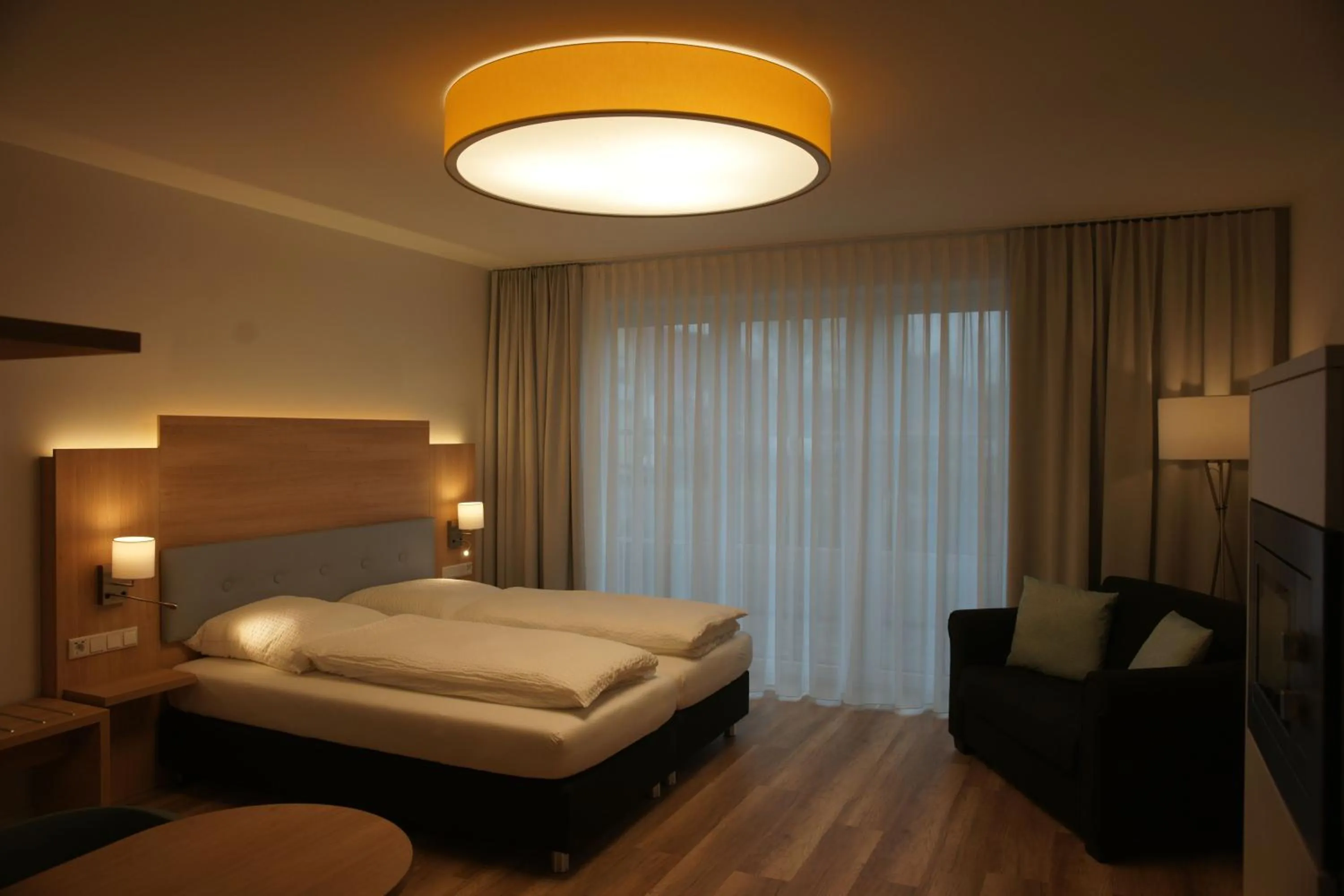 Bed in Leister Apparthotel