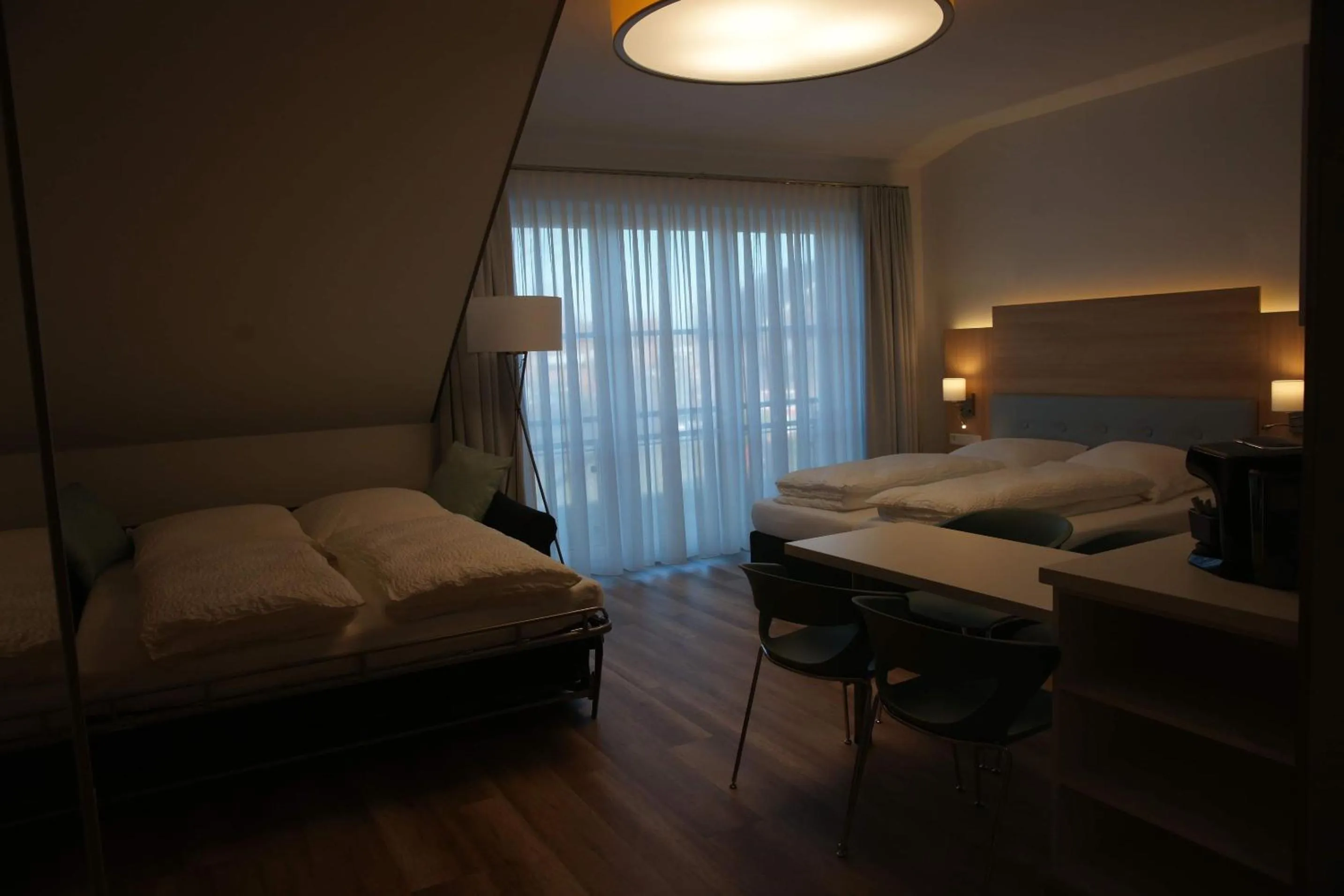 Bed in Leister Apparthotel