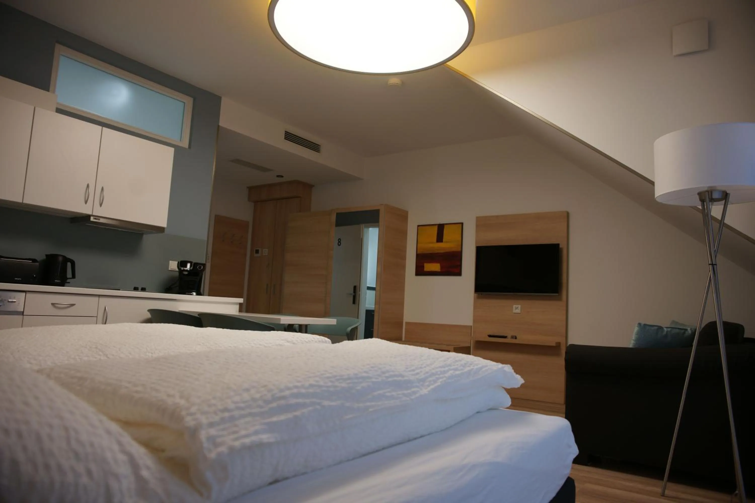 Bed in Leister Apparthotel