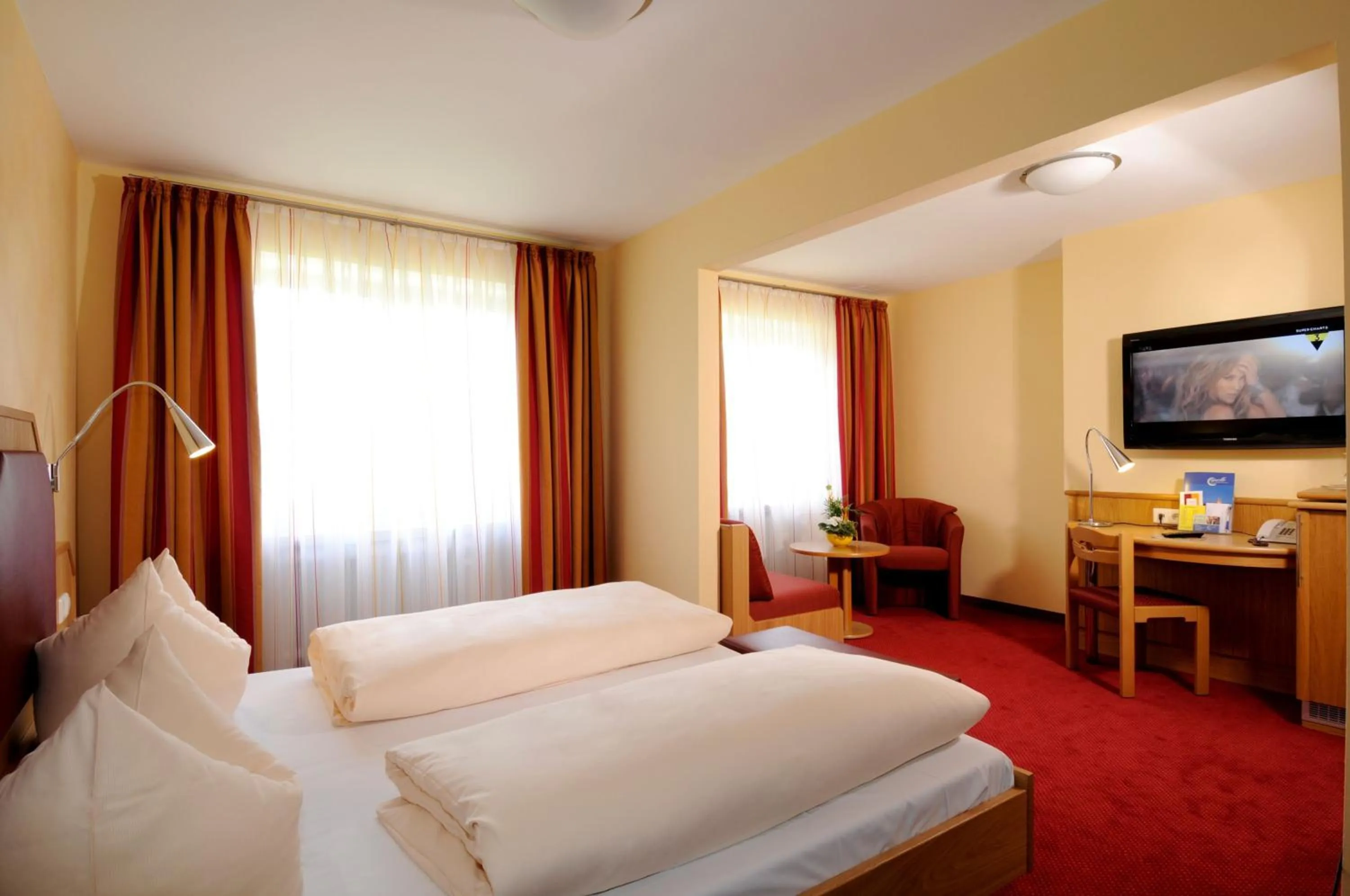 Photo of the whole room in Hotel Apollo Garni
