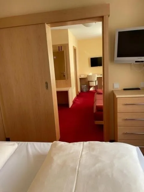 Photo of the whole room in Hotel Apollo Garni