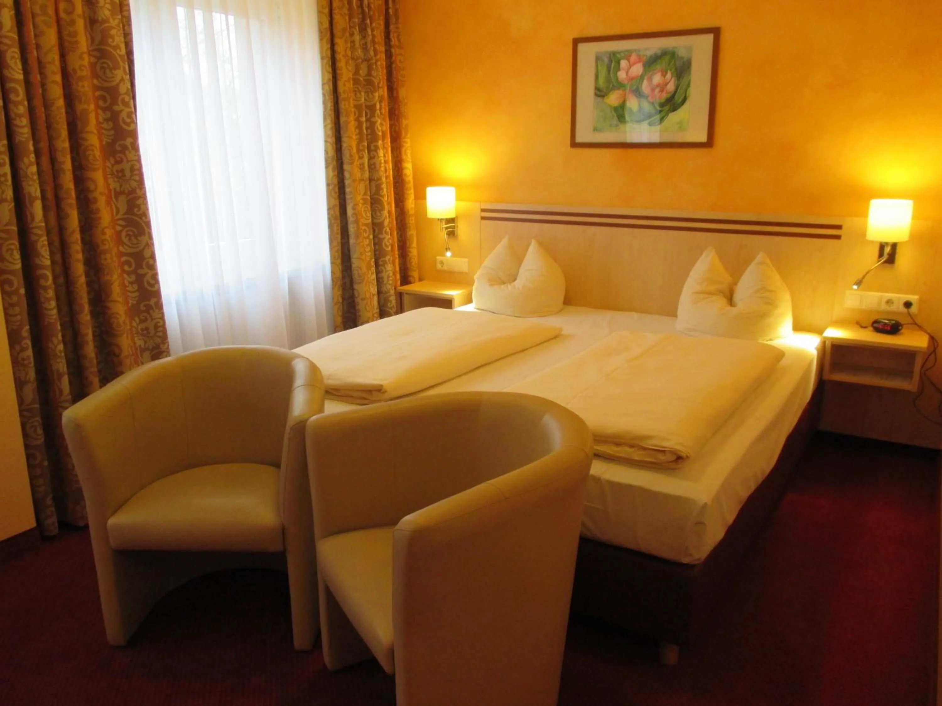 Bed in Hotel Apollo Garni