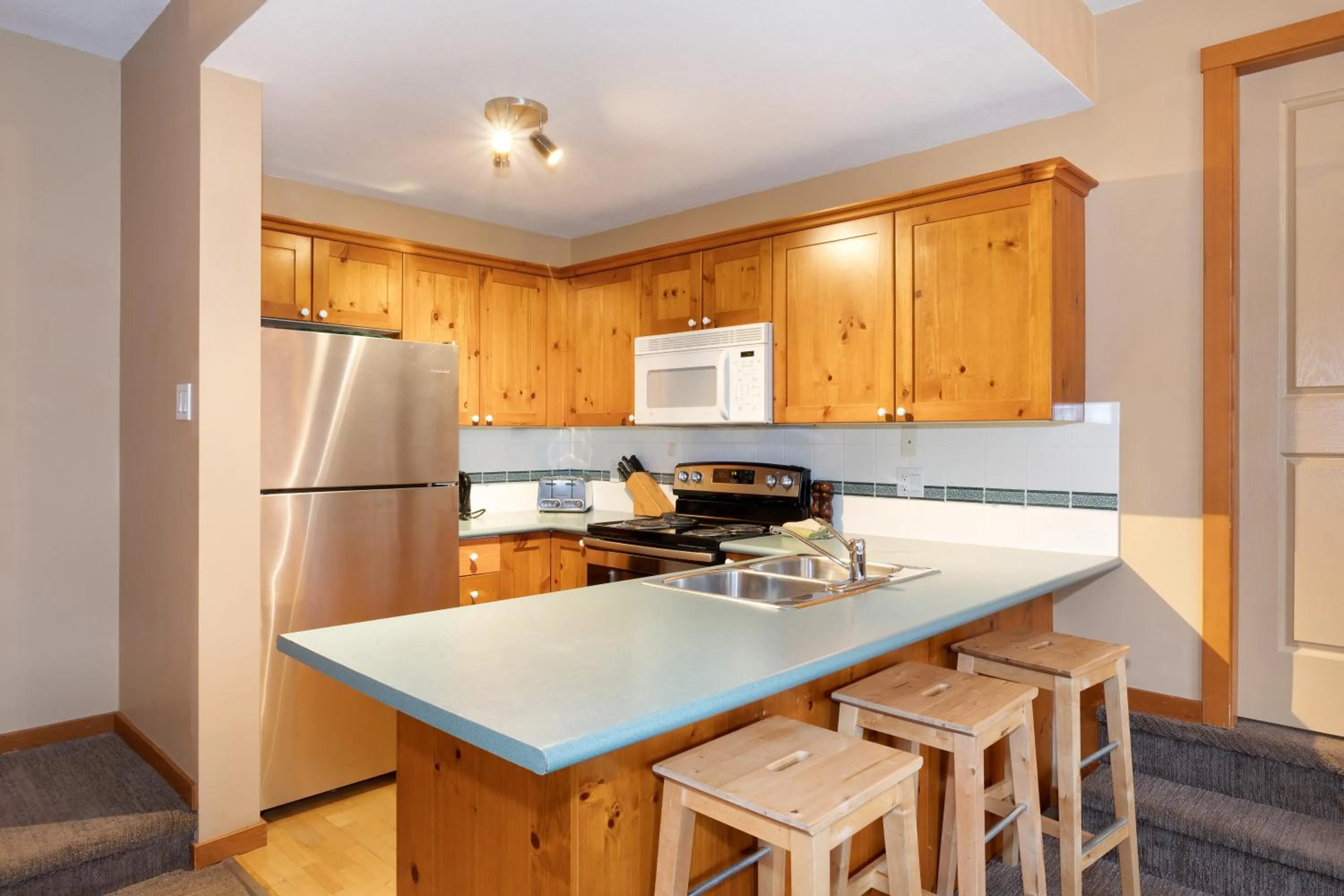 Kitchen or kitchenette in Symphony by Whistler Premier