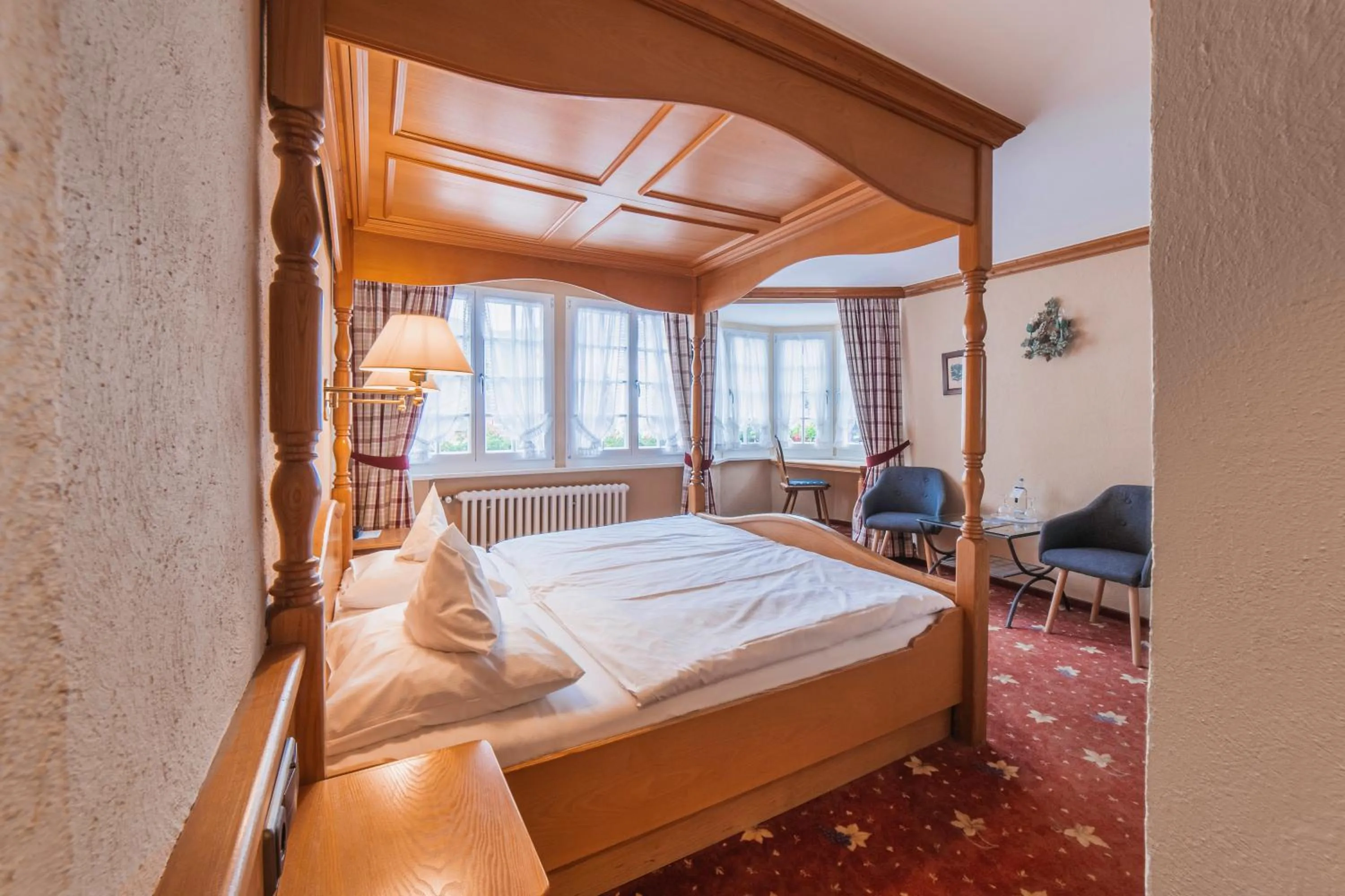 Photo of the whole room, Bed in AKZENT Hotel Berg's Alte Bauernschänke- Wellness und Wein