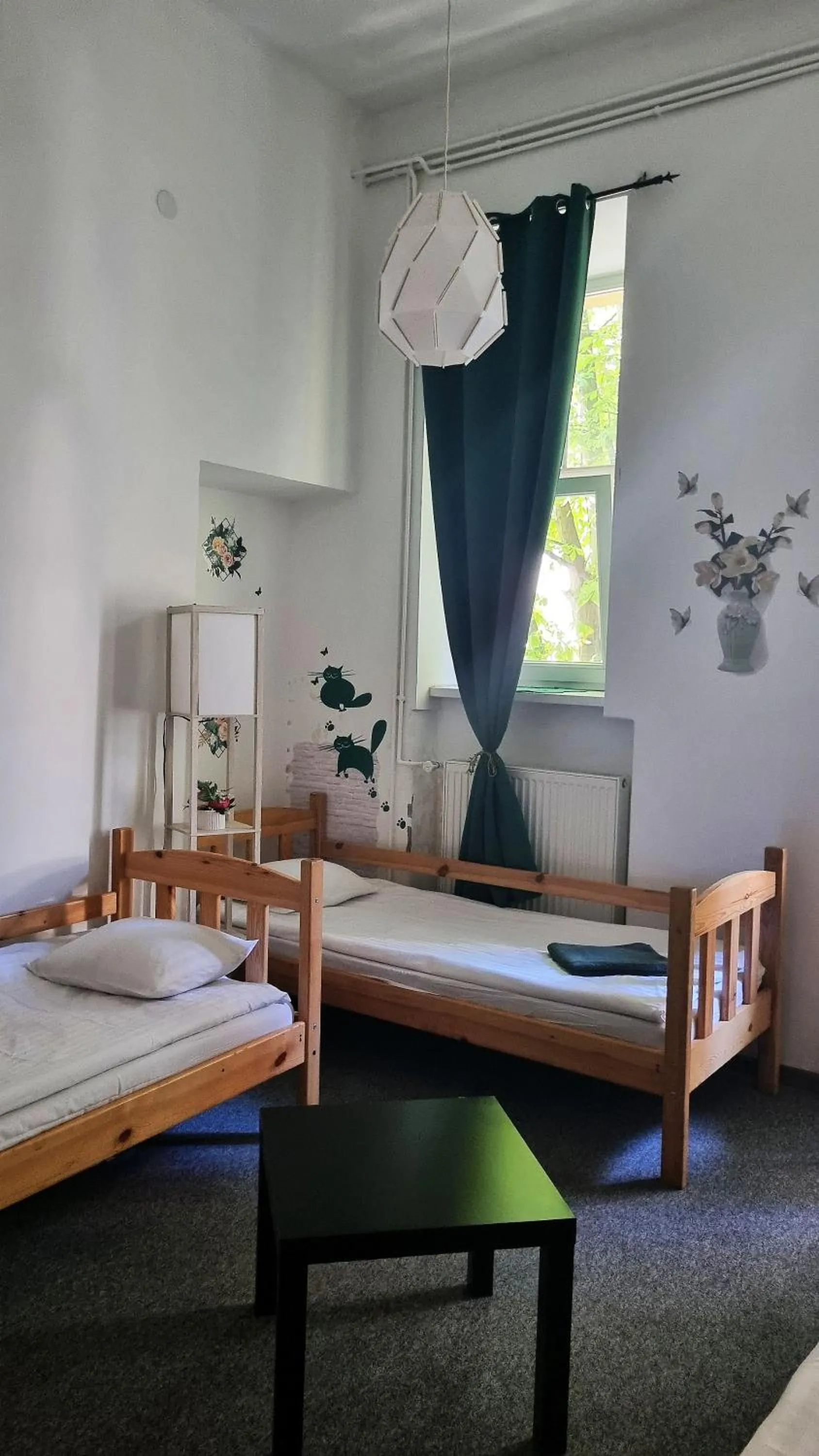 Bed in Green Cat Rooms