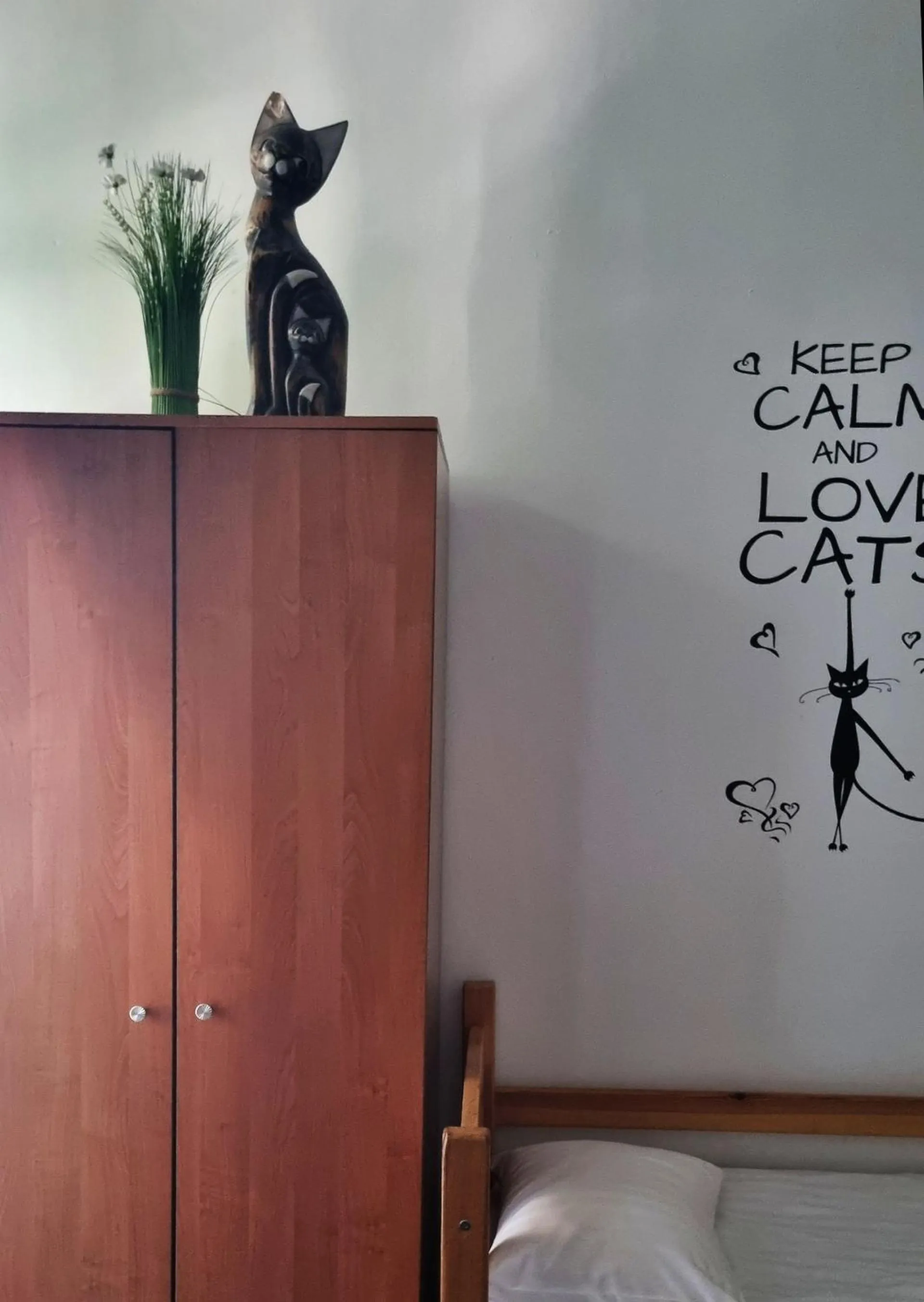 Bed in Green Cat Rooms