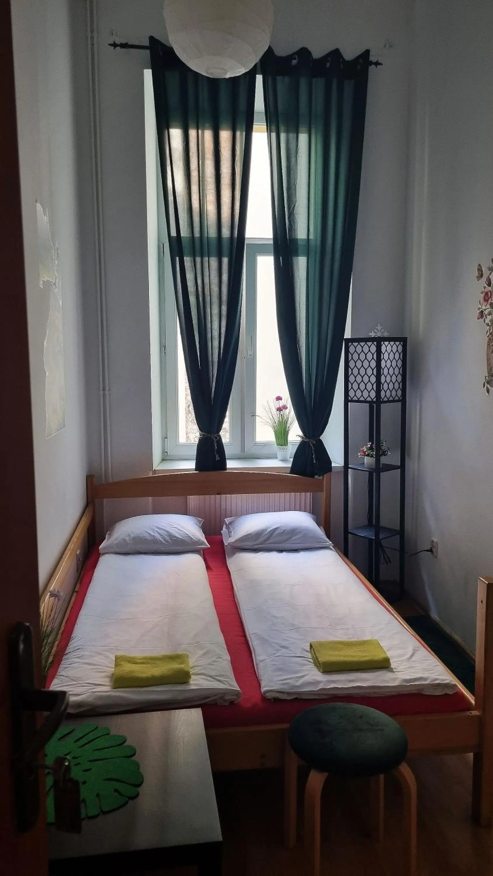 Bed in Green Cat Rooms