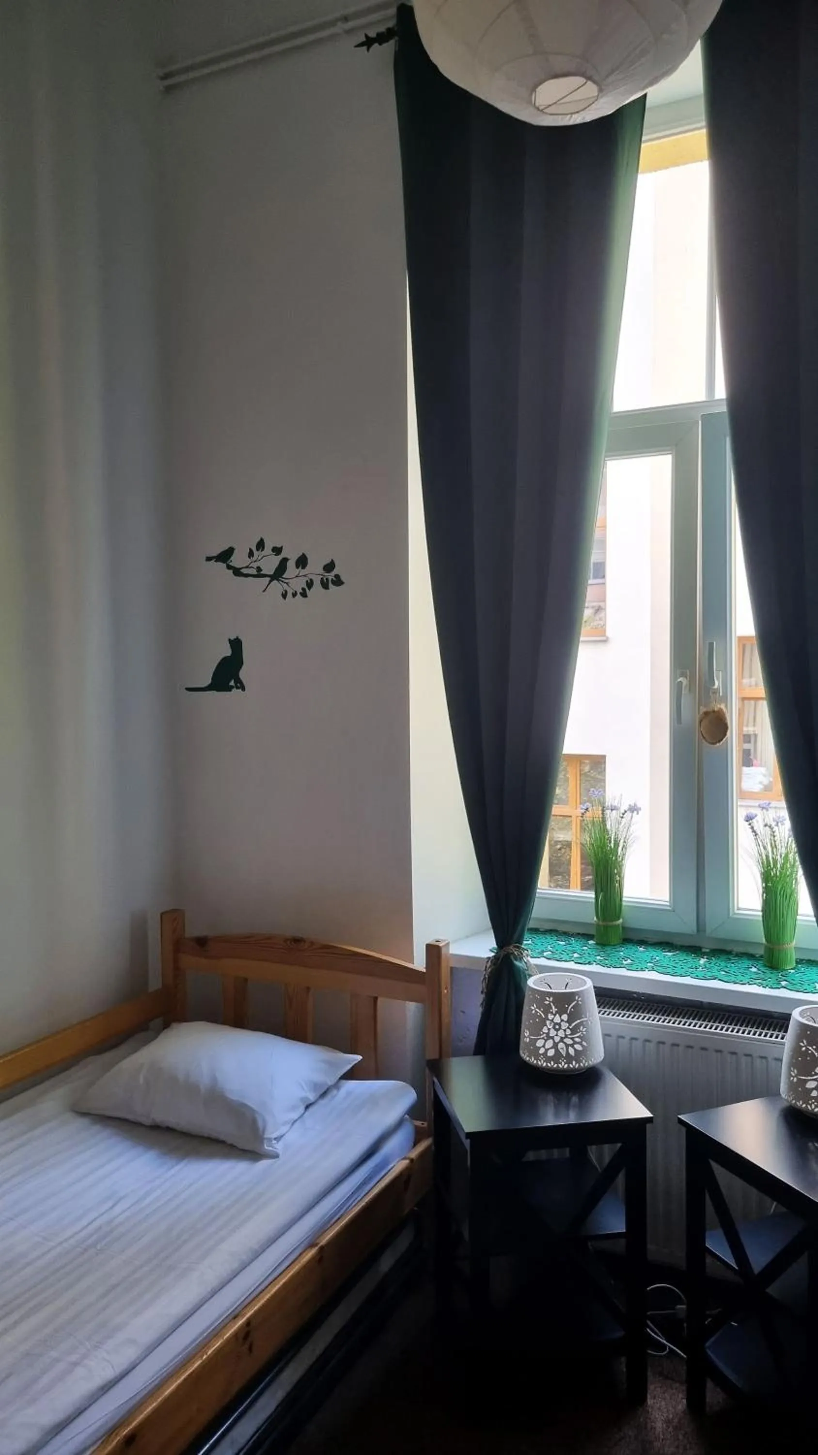 Bed in Green Cat Rooms