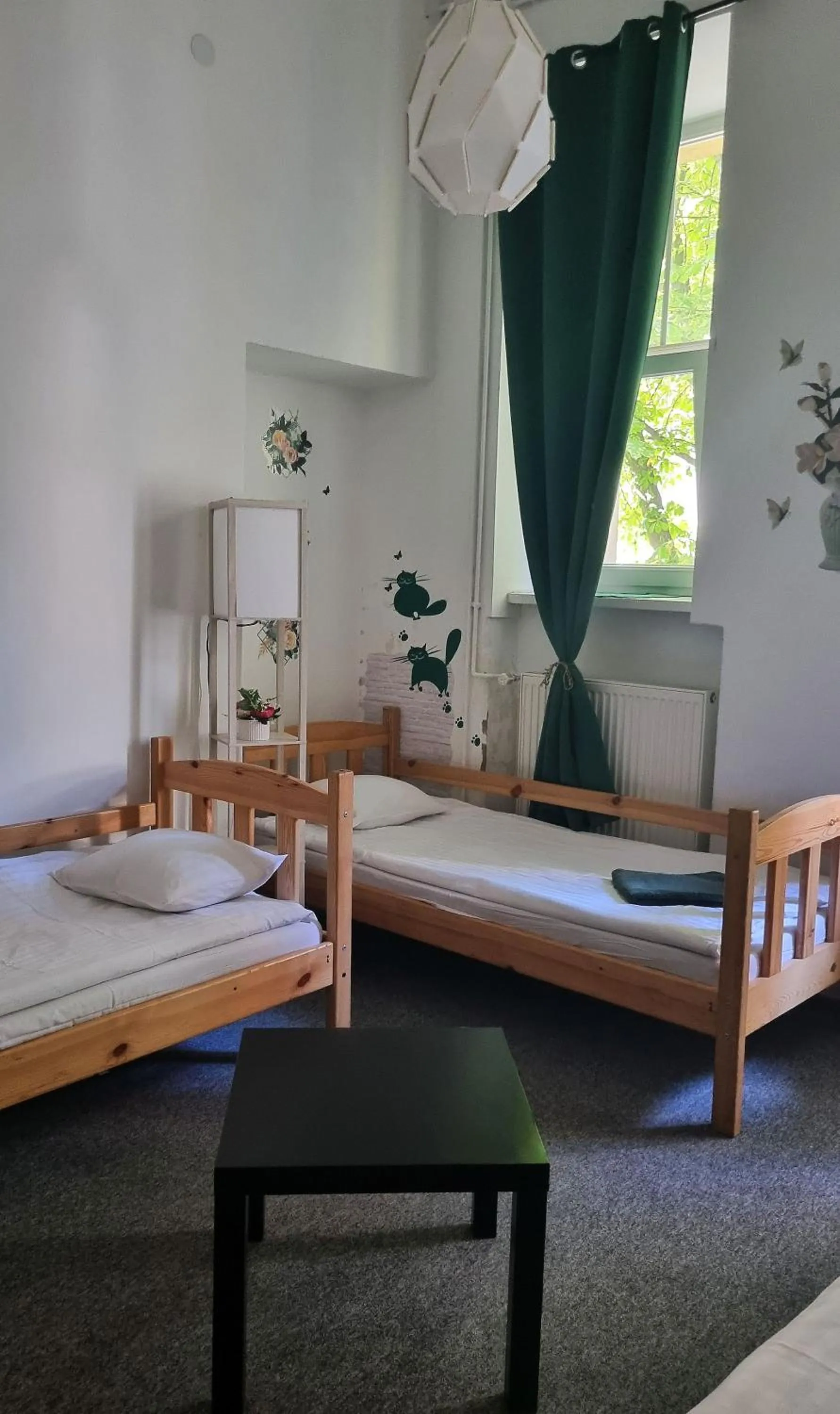 Bed in Green Cat Rooms