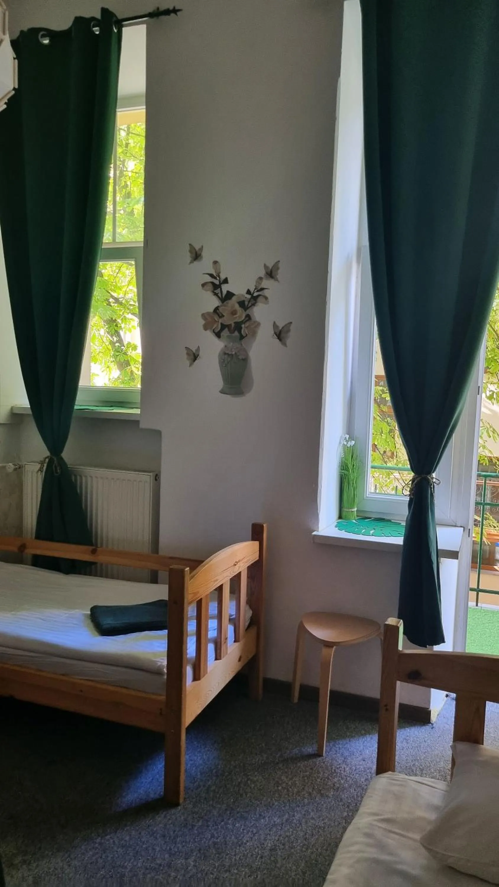 Bed in Green Cat Rooms