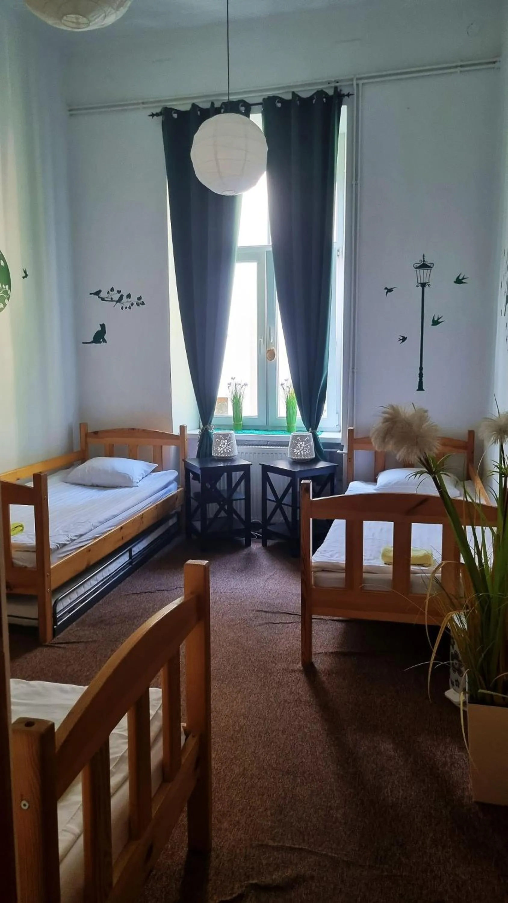 Bed in Green Cat Rooms