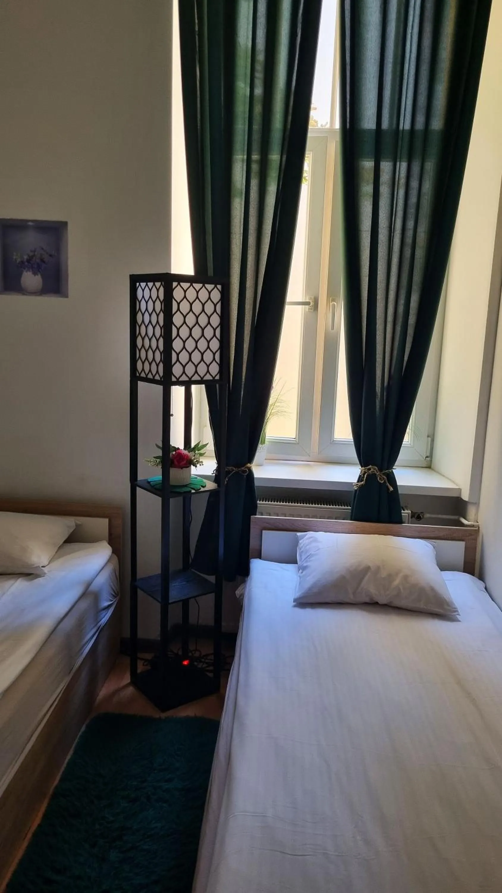 Bed in Green Cat Rooms