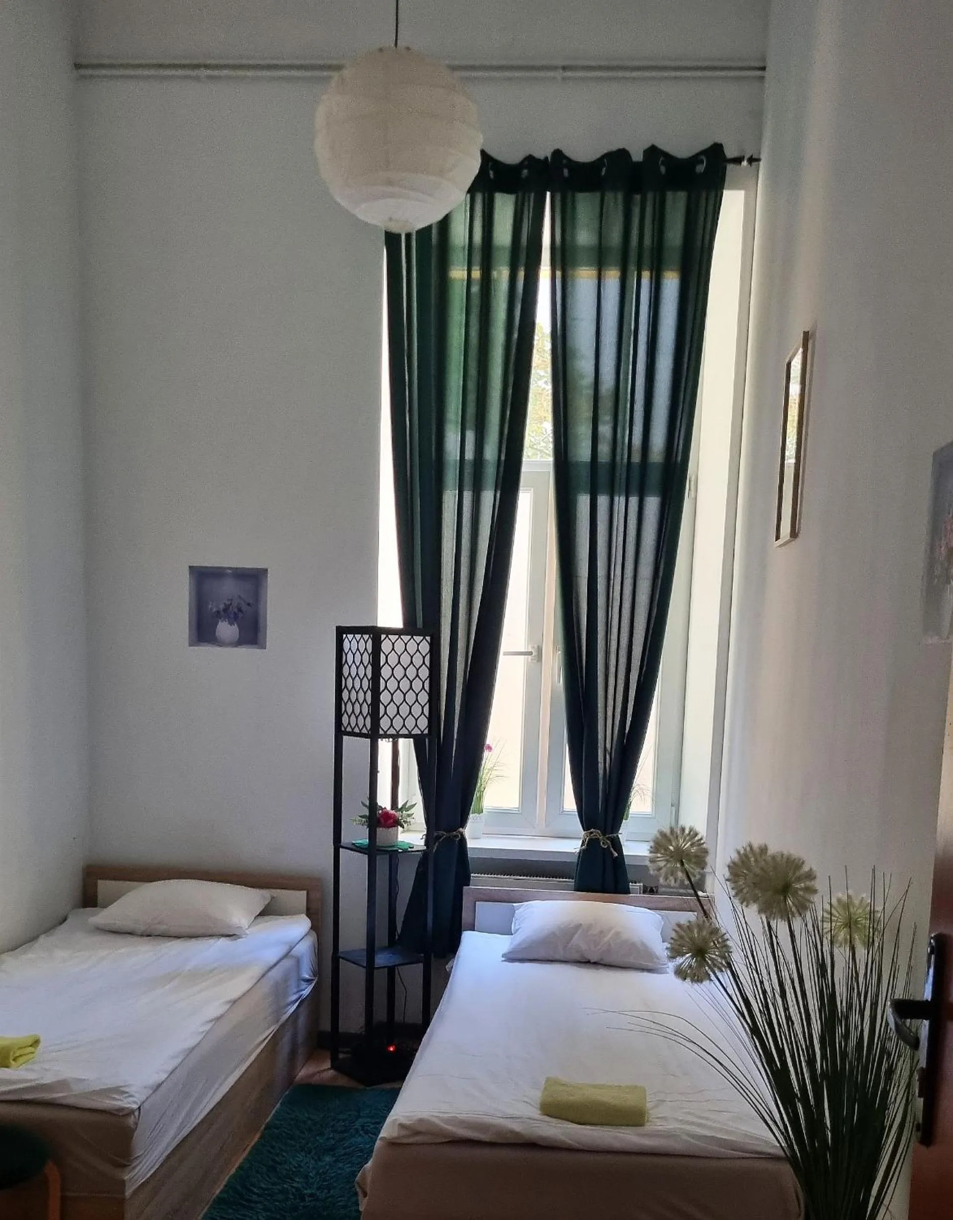 Bed in Green Cat Rooms