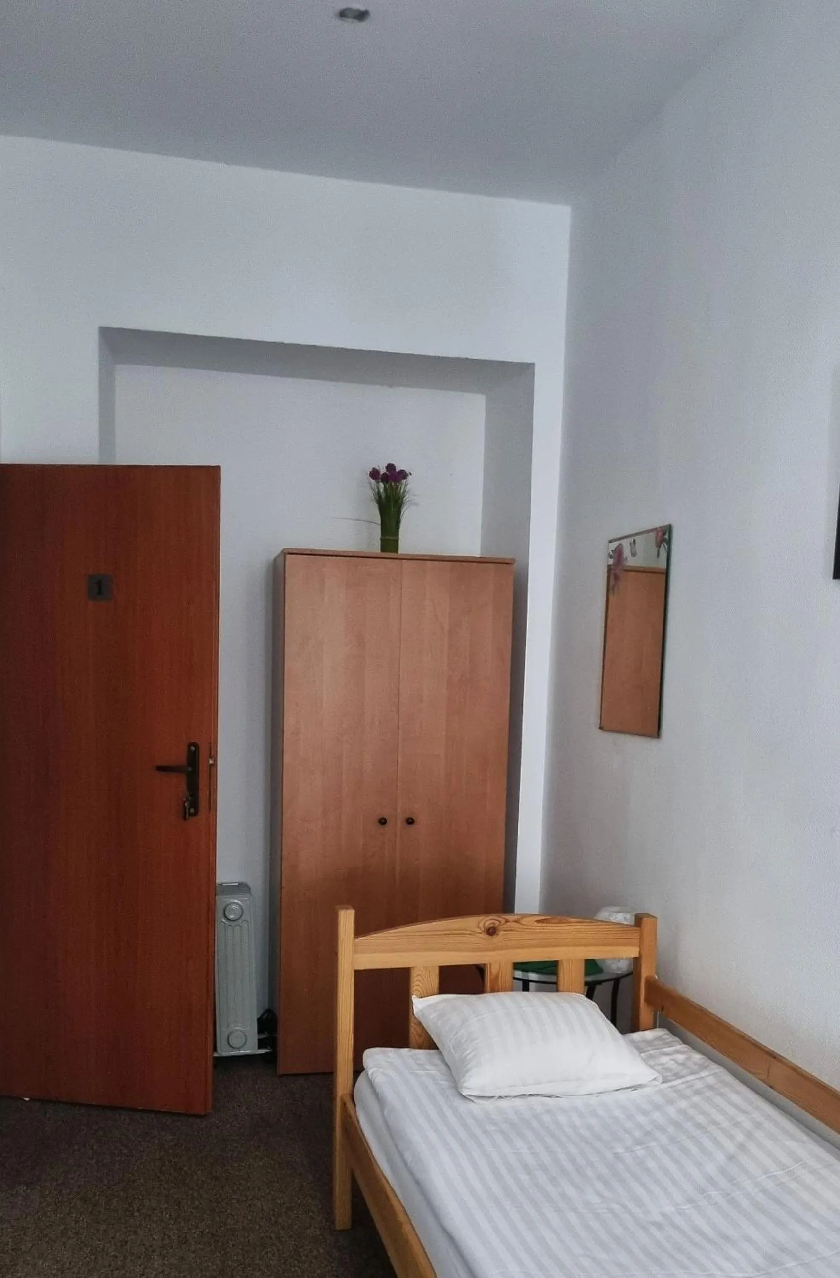 Bed in Green Cat Rooms