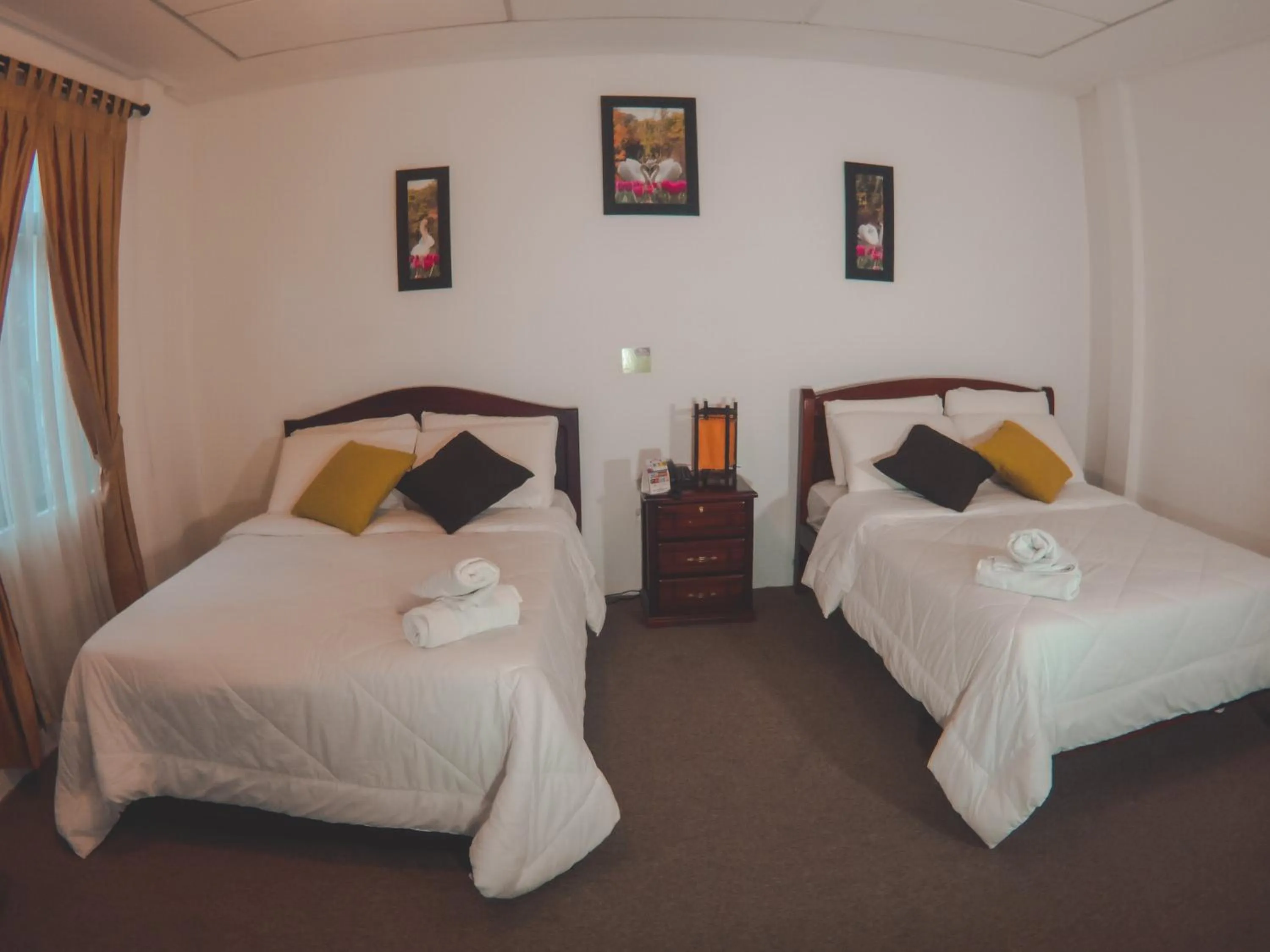 Bed in Hotel 4 Mundos