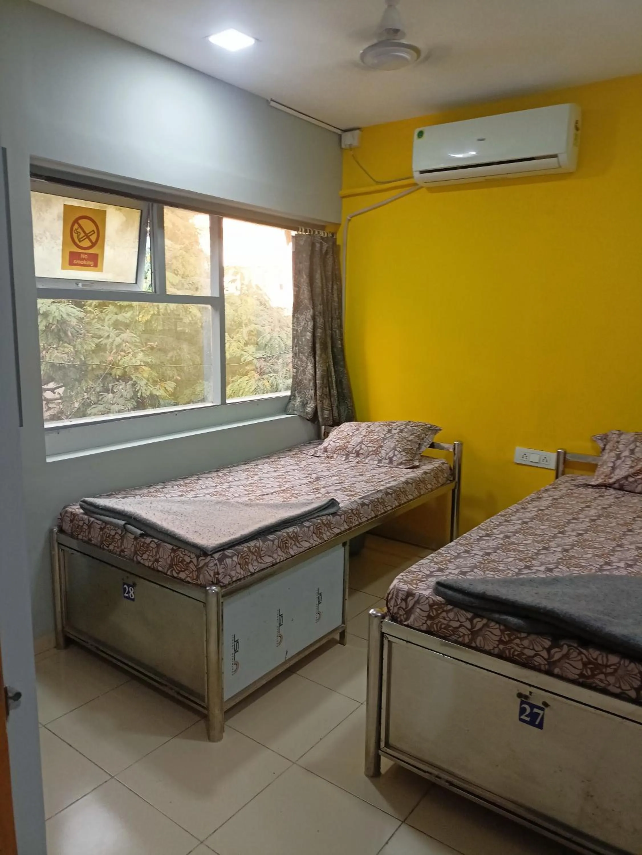 Bed in Shiv Sai Dormitory