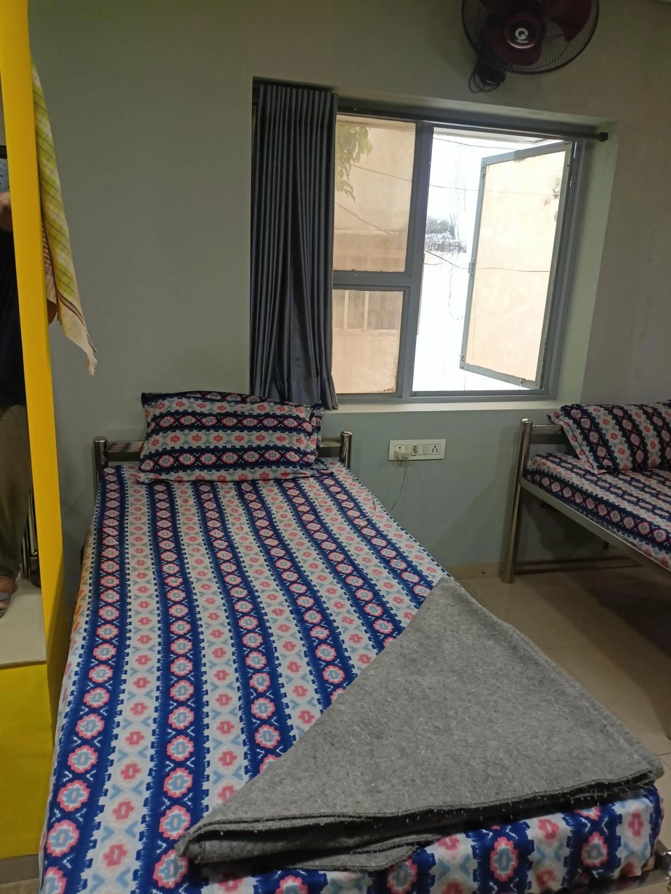 Bed in Shiv Sai Dormitory