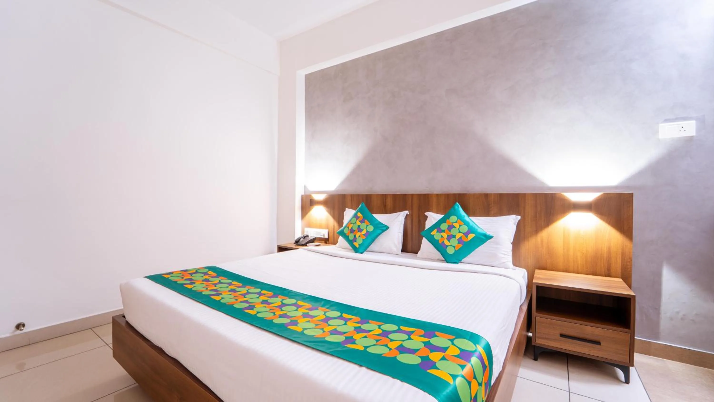 Bedroom, Bed in Treebo Petals Suites