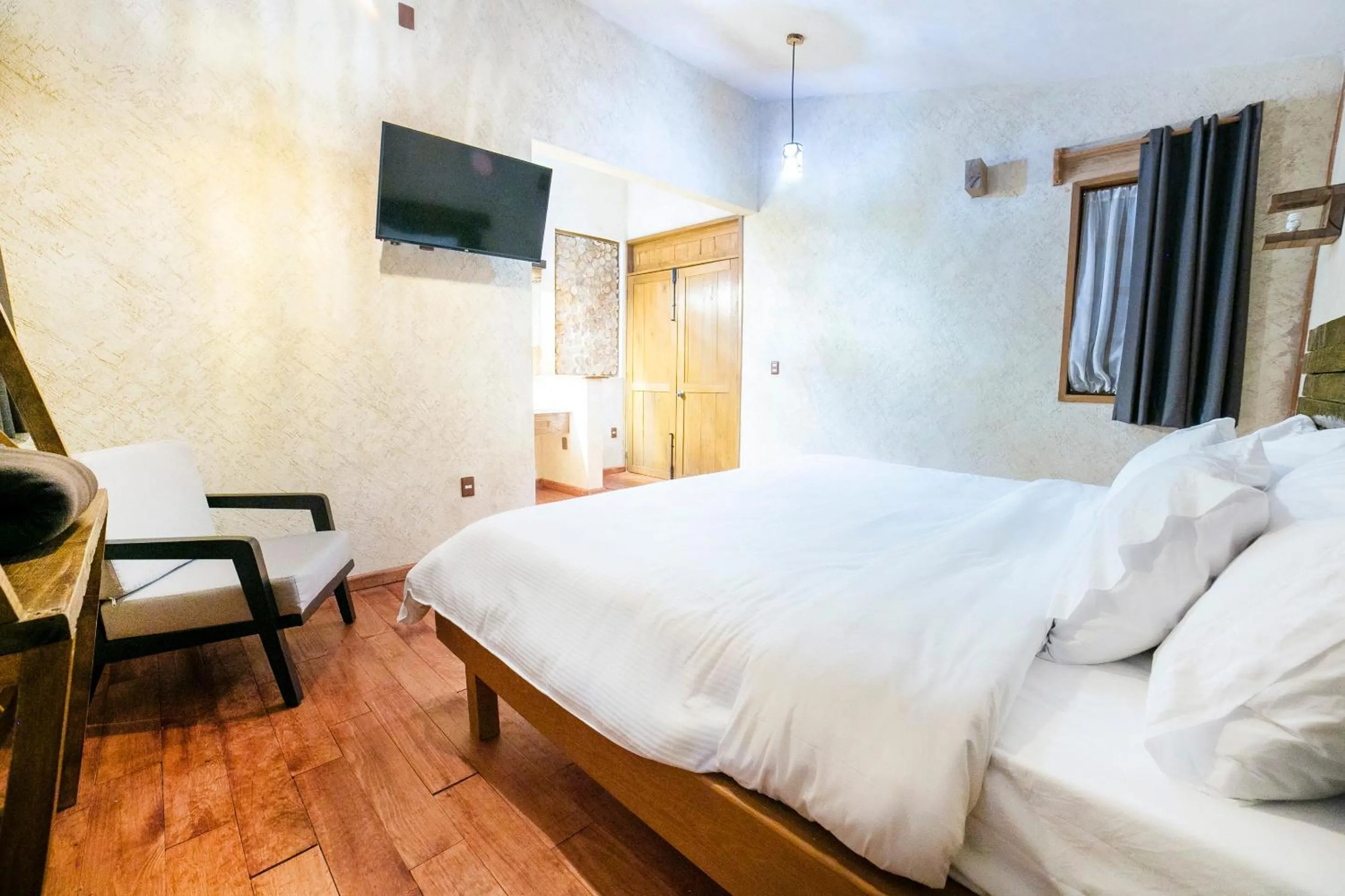 Bedroom in Capital O Collection O Casona De Minas Mineral del Monte